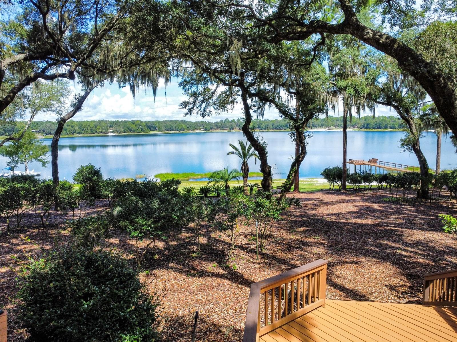 A view from the back of the house over Lake Rosa - 202 MASON RD, MELROSE