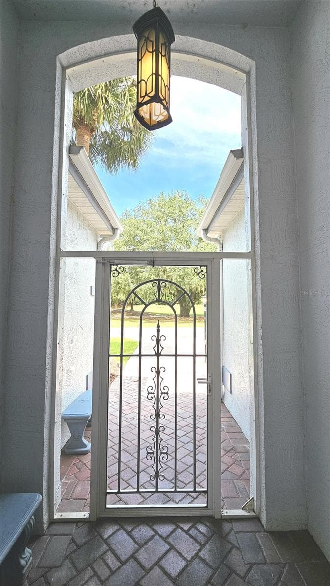 Gated Entry to Courtyard - 730 SAN MARINO DR, THE VILLAGES