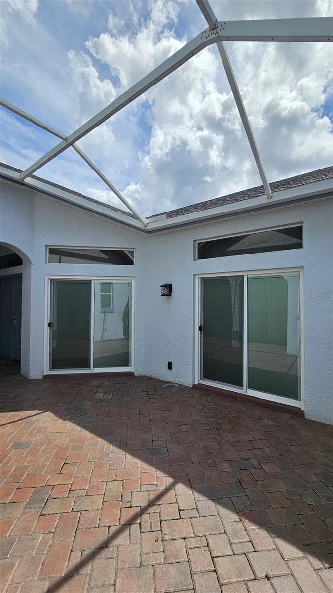 Birdcage over Courtyard - 730 SAN MARINO DR, THE VILLAGES