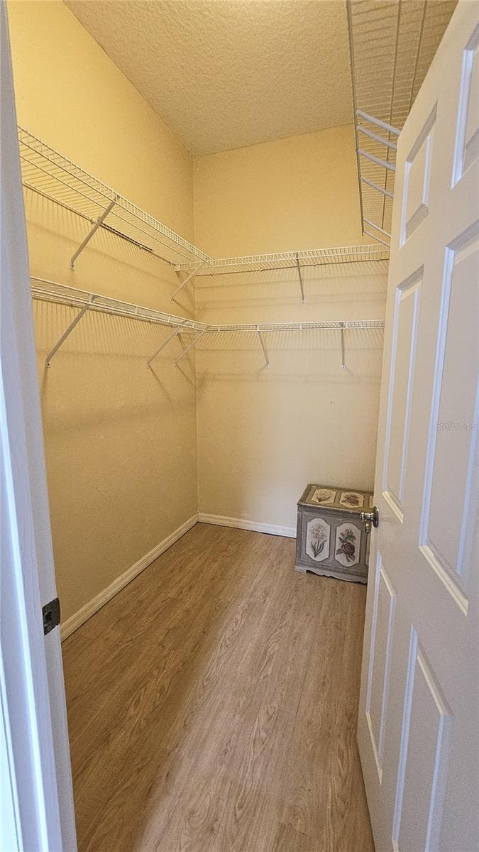 Walk In Closet/Guest Area - 730 SAN MARINO DR, THE VILLAGES