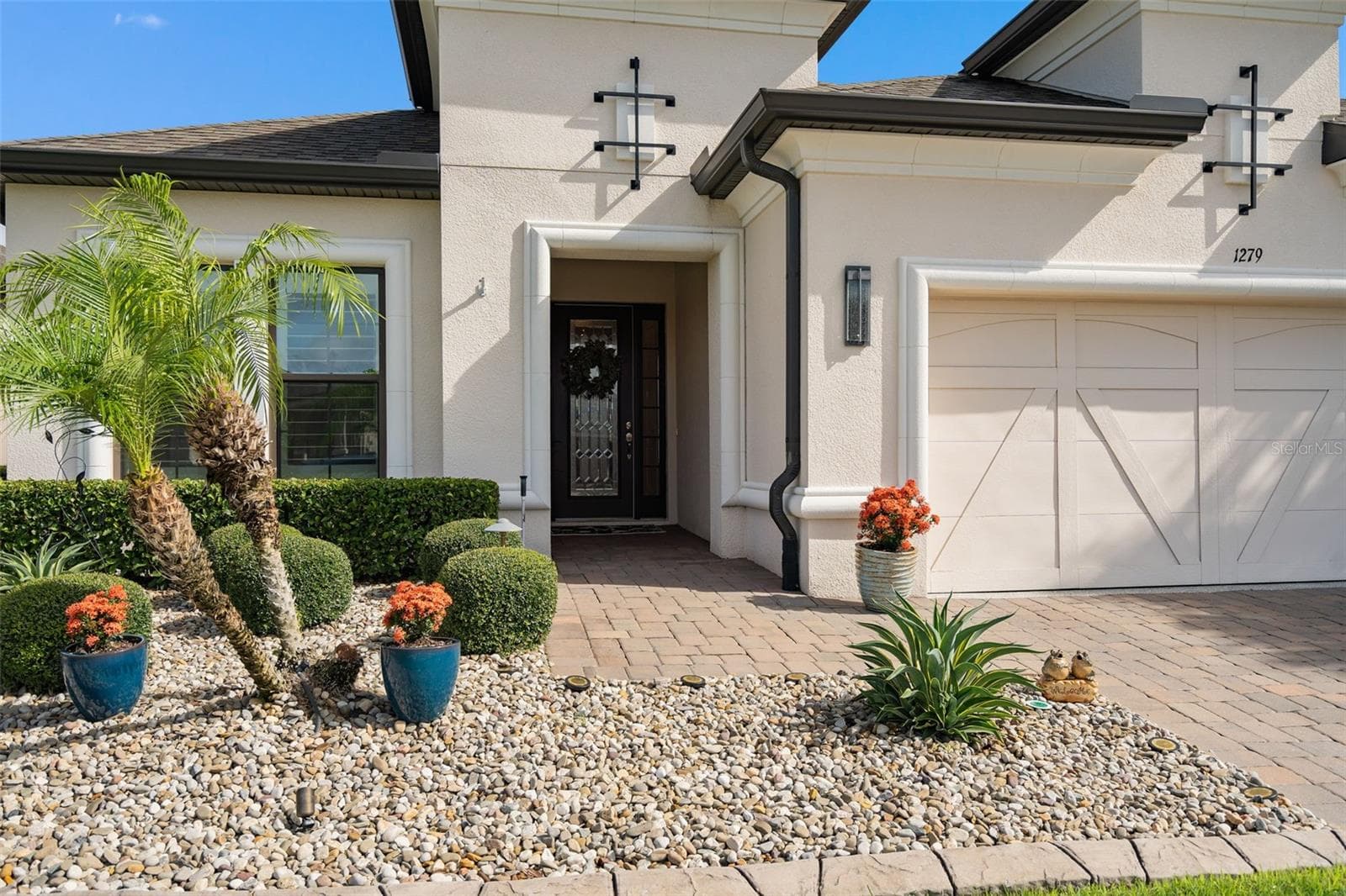 Front under cover entrance. - 1279 ZEEK RIDGE ST, CLERMONT