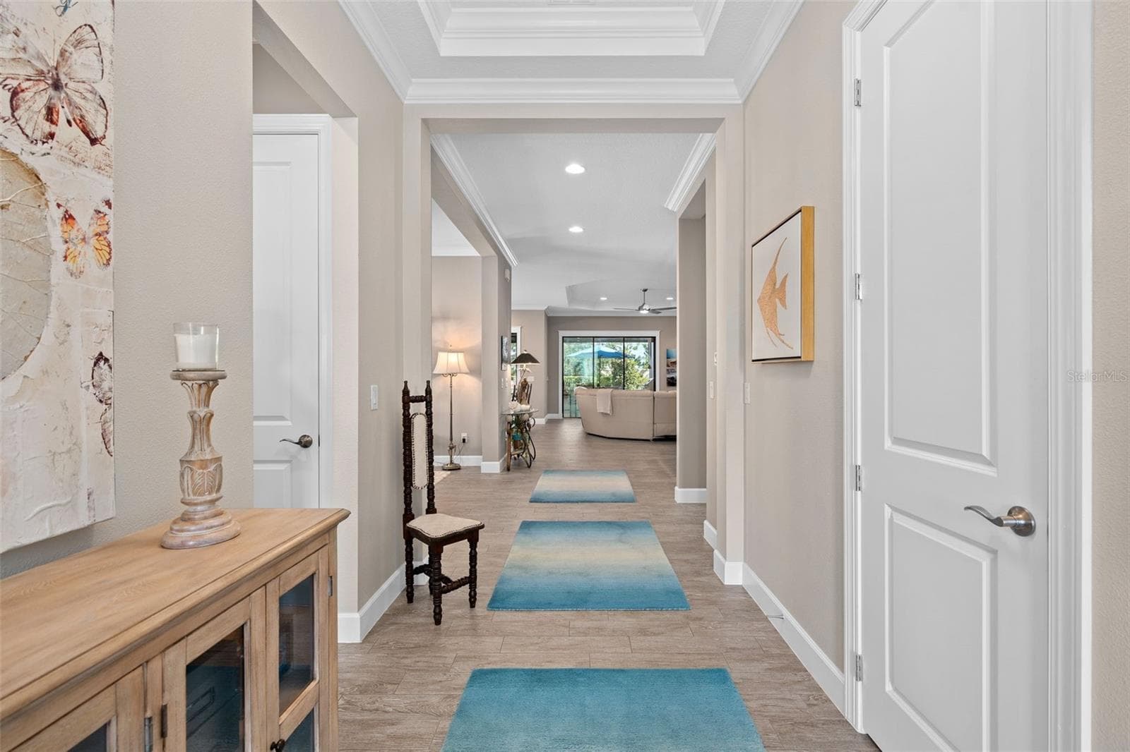 Upon entry you will be greeted by a see through floor plan offering 10' ceilings with tray's and crown molding. - 1279 ZEEK RIDGE ST, CLERMONT