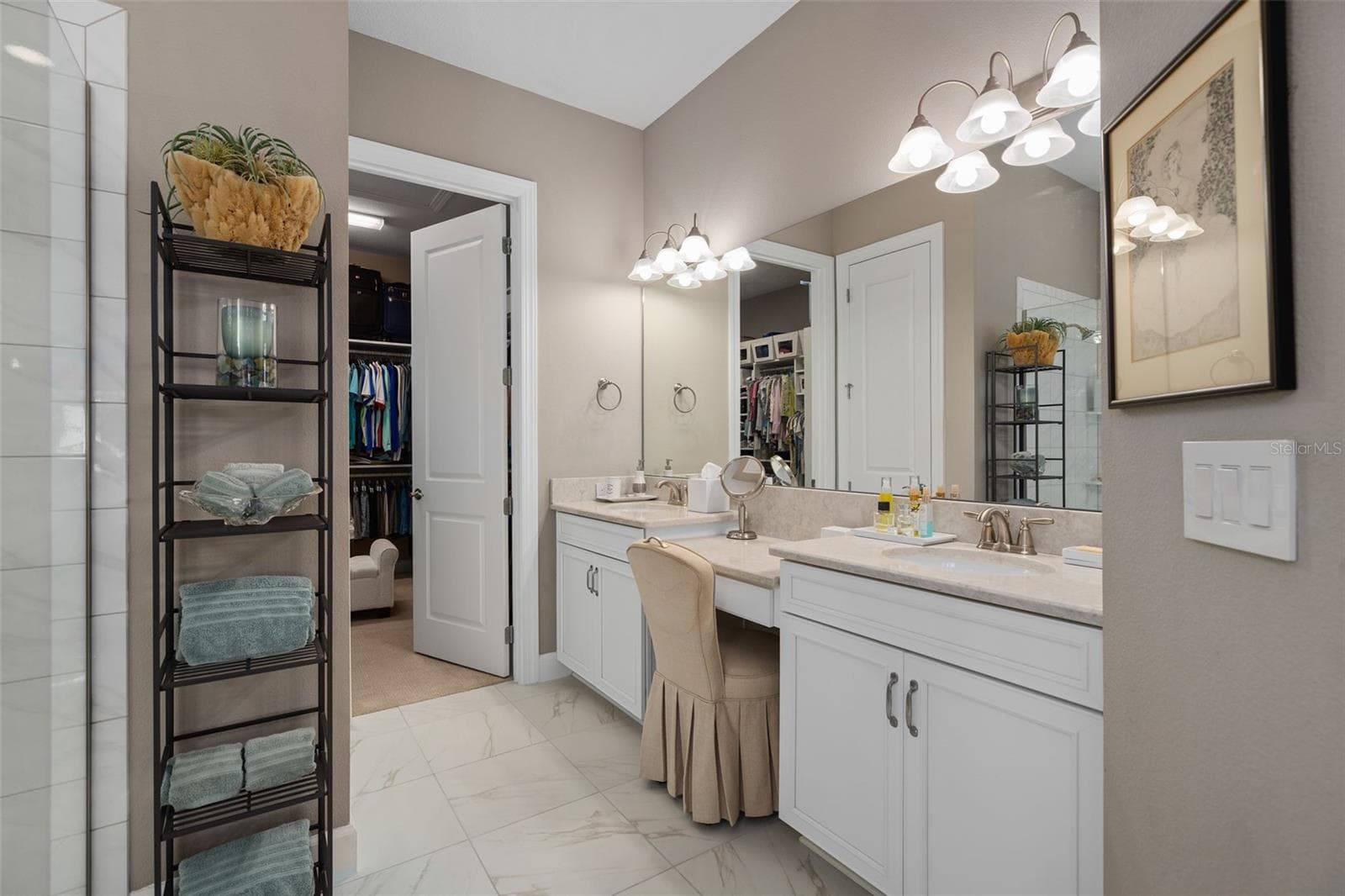 Primary En-Suite offering a larger walk-in closet, separate water closet and a walk-in shower. - 1279 ZEEK RIDGE ST, CLERMONT