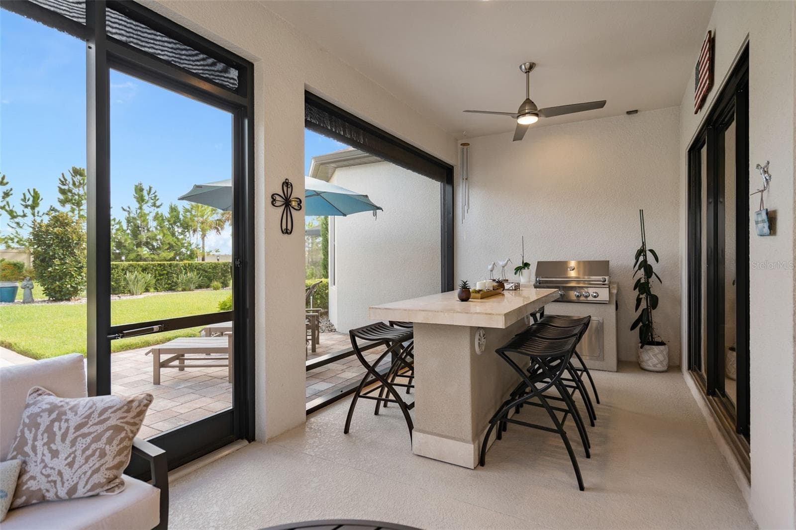 Enjoy cooking on the outdoor grill while taking advantage of the Florida weather. Wait until you see the back yard. - 1279 ZEEK RIDGE ST, CLERMONT