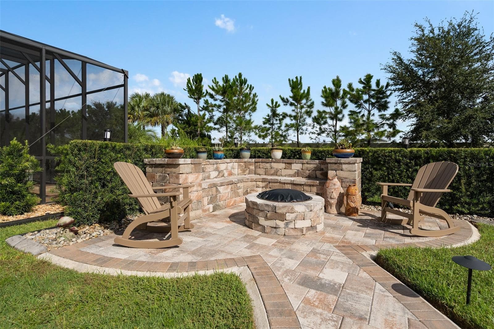Gather around the fire pit and sip on your favorite beverage. - 1279 ZEEK RIDGE ST, CLERMONT