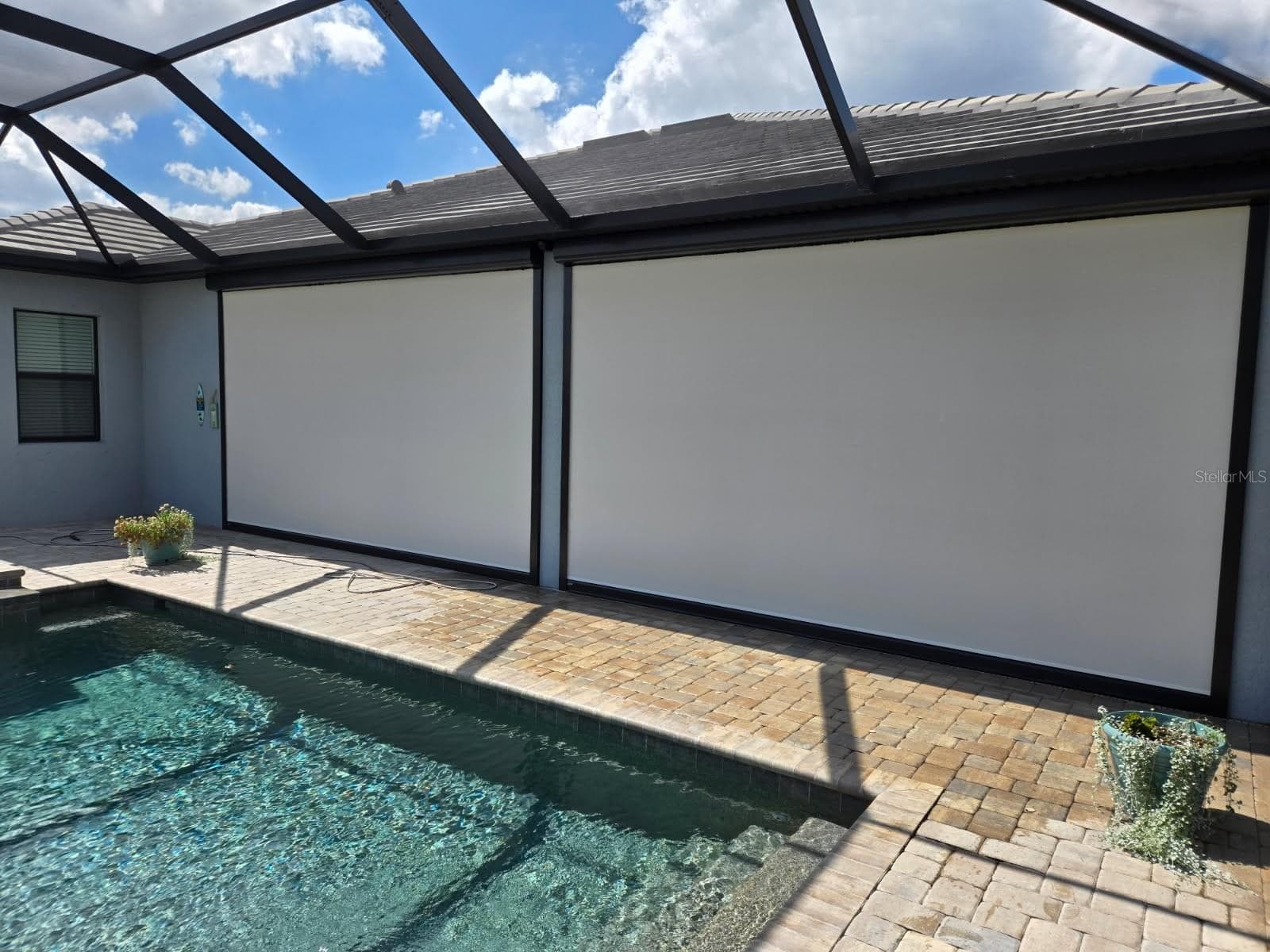 Automatic SPF hurricane screens - 4915 SPARKLING SEA LN, BRADENTON