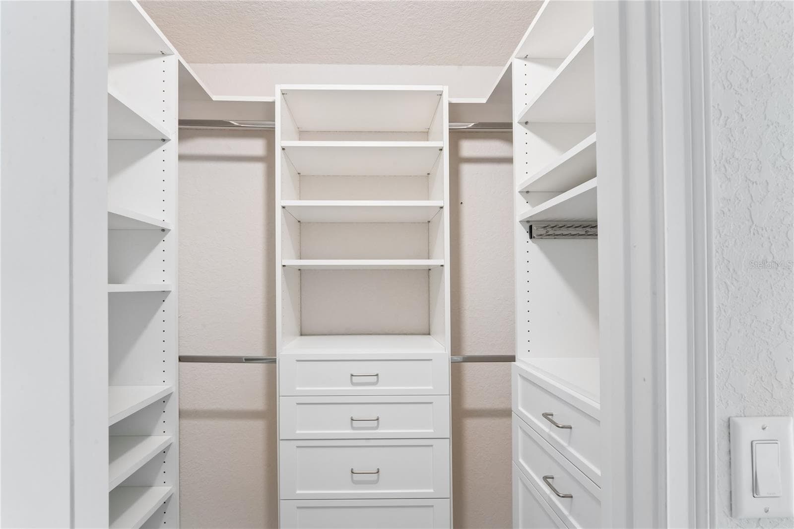 Primary walk-in closet - 145 LINDER DR, HOMOSASSA