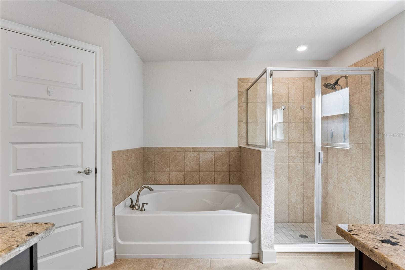 Primary bath with Garden tub and separate shower - 145 LINDER DR, HOMOSASSA