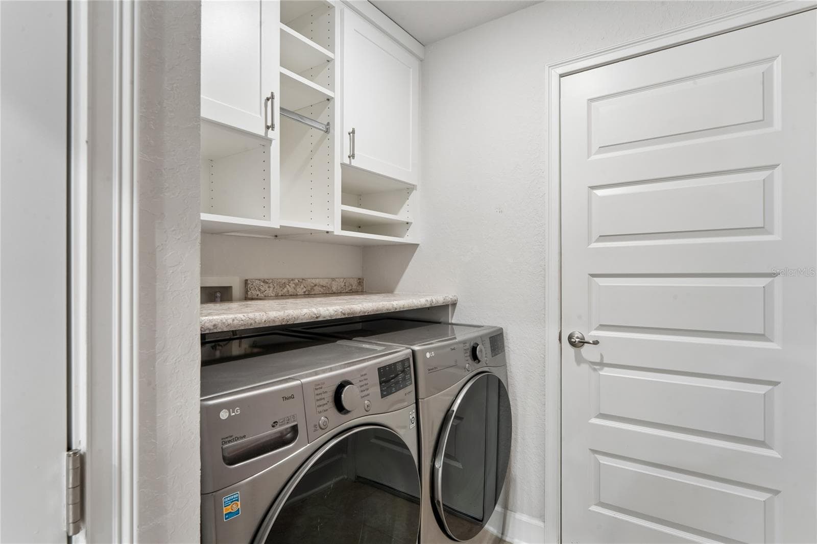 Inside Laundry room with extra closet (with custom shelving)!! - 145 LINDER DR, HOMOSASSA