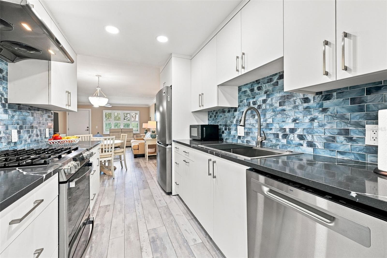 Beautifully upgraded kitchen with custom cabinets, and a GAS stove! - 1898 SHORE DR S #208, SOUTH PASADENA