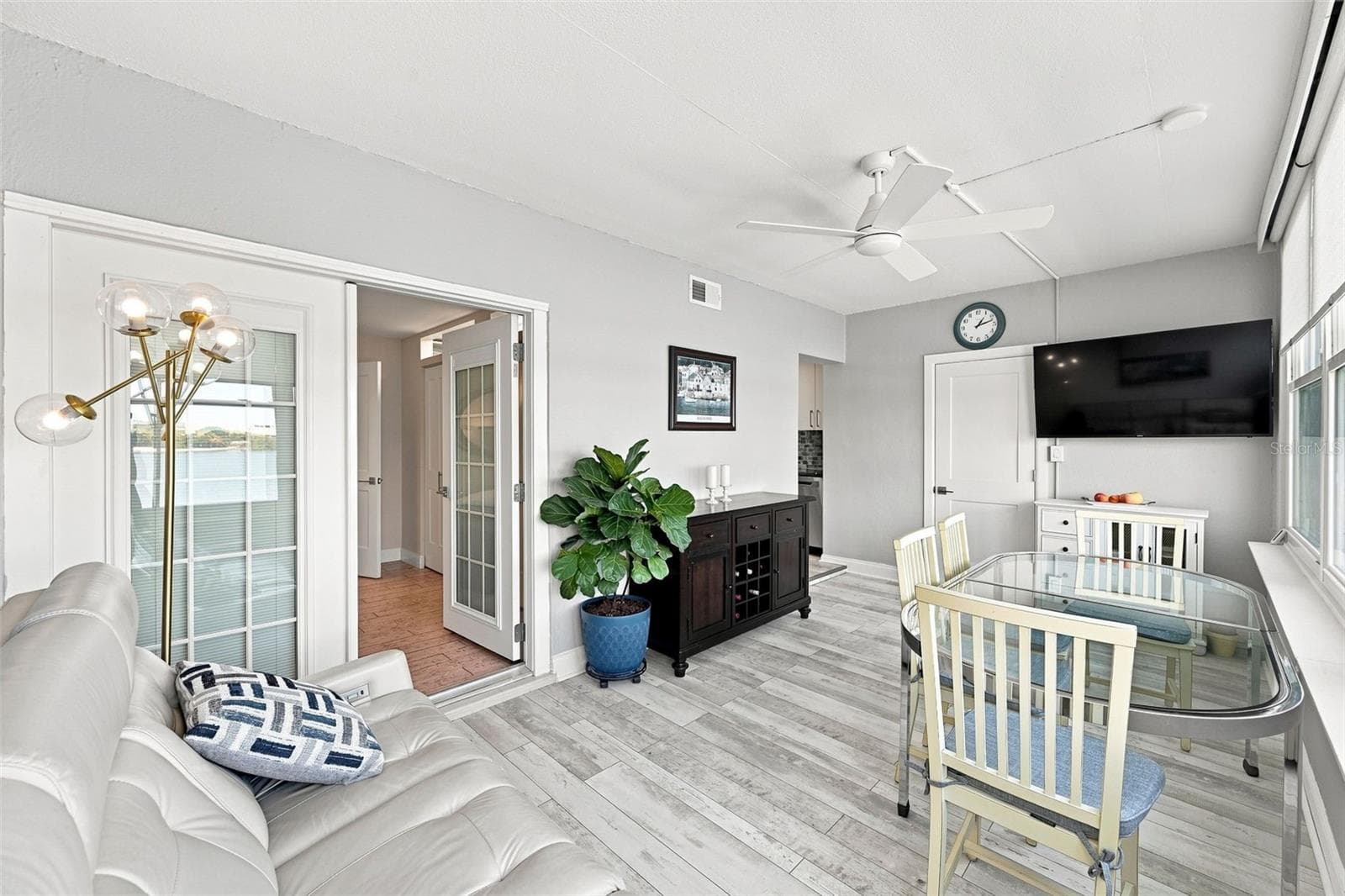 The family room, looking in from the waterfront view! - 1898 SHORE DR S #208, SOUTH PASADENA