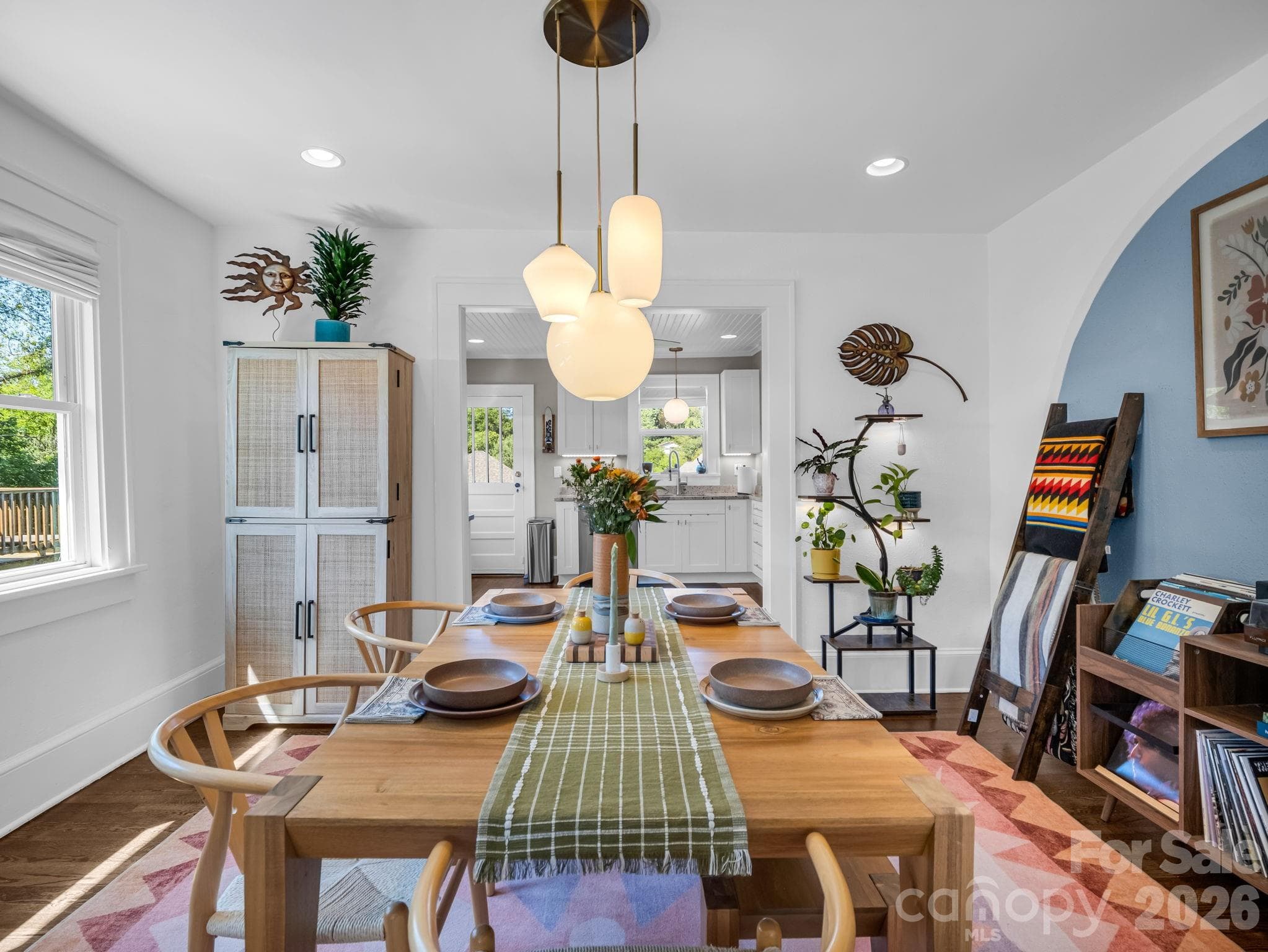 dining room with upgraded lighting, classic character, and tasteful updates - 10 Dale Street, Asheville