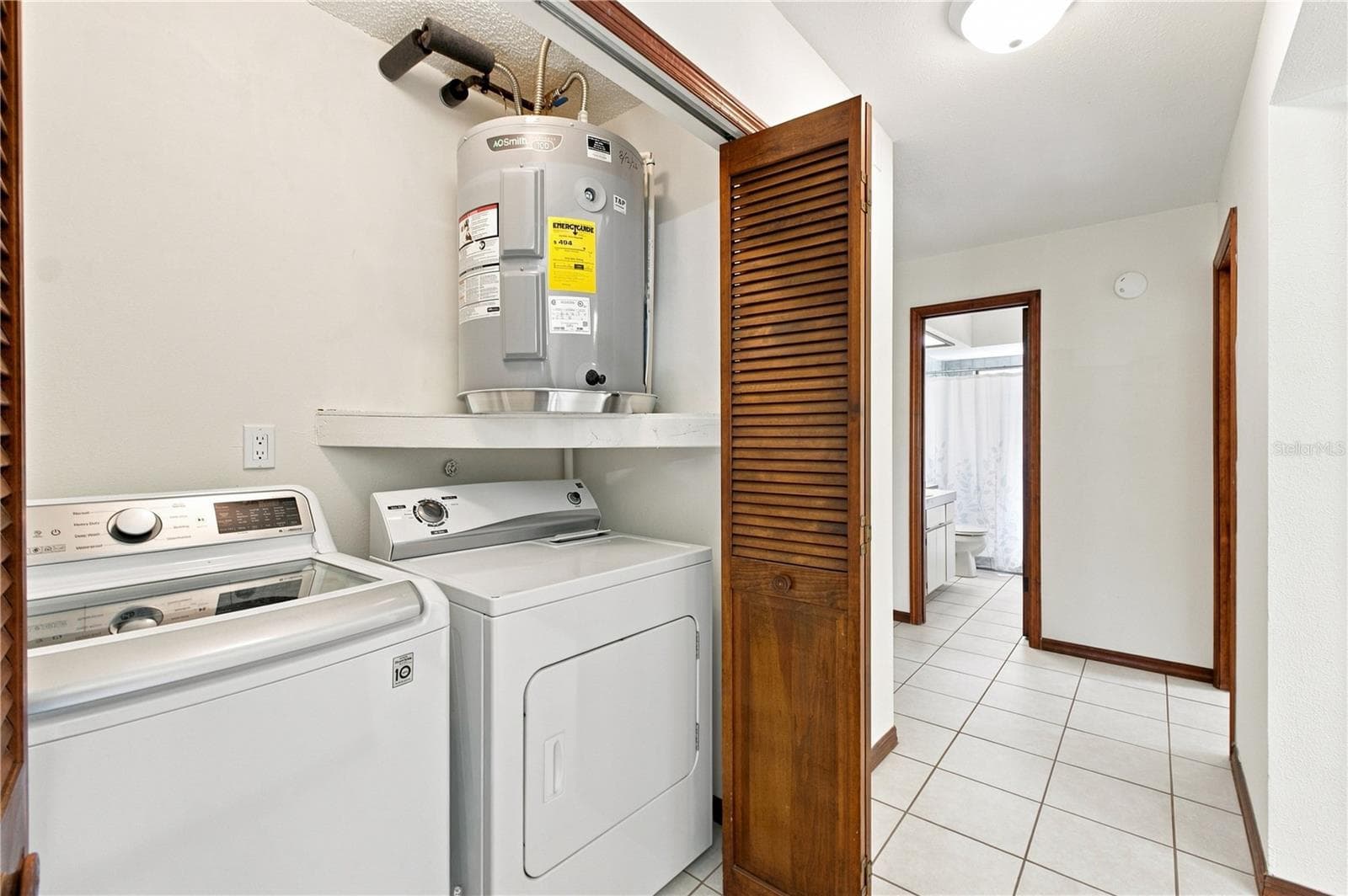 INSIDE LAUNDRY ROOM - 15125 WILLOWOOD LN, SPRING HILL