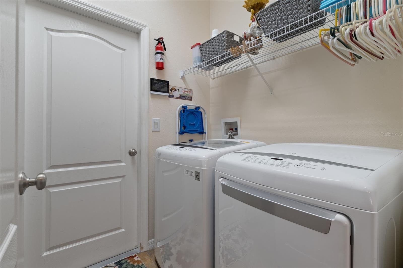 The Washer and Dryer stay with the home in the inside laundry room - 14056 LEYBOURNE WAY, SPRING HILL