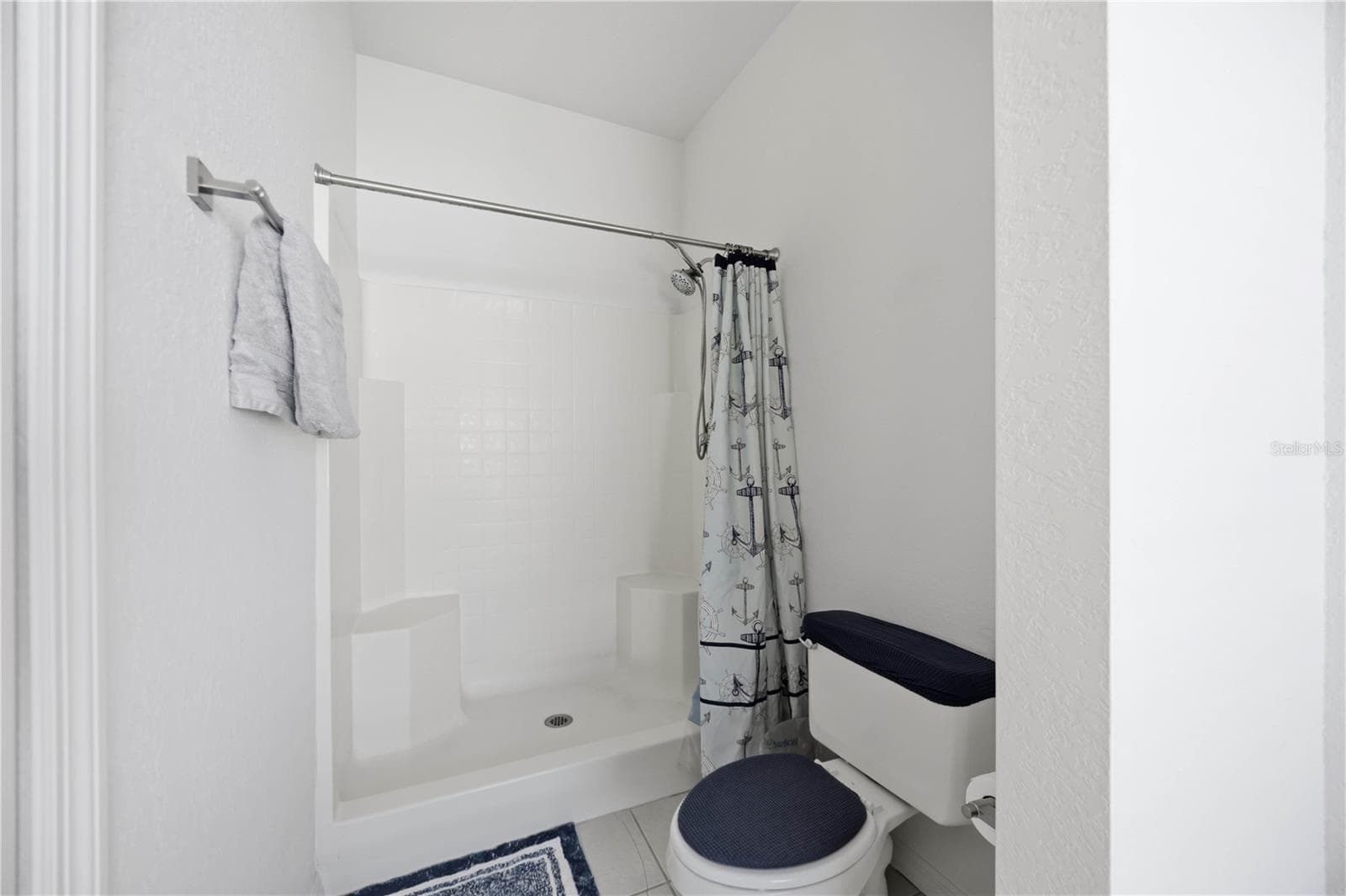 Walk in shower and cammode area - 1150 KNOTTY PINE AVE, NORTH PORT