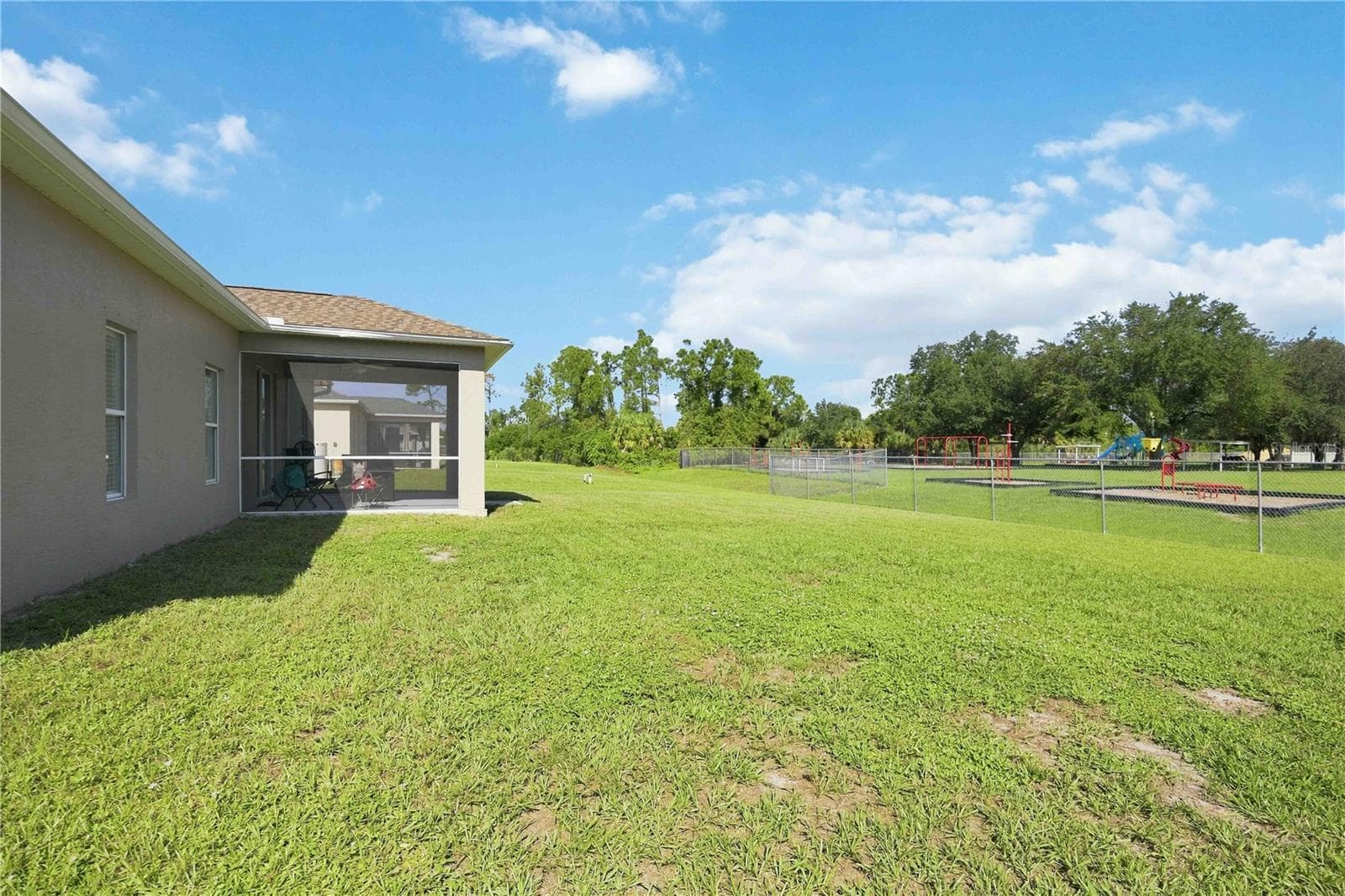 No neighbors behind you, opens up to a school. - 1150 KNOTTY PINE AVE, NORTH PORT