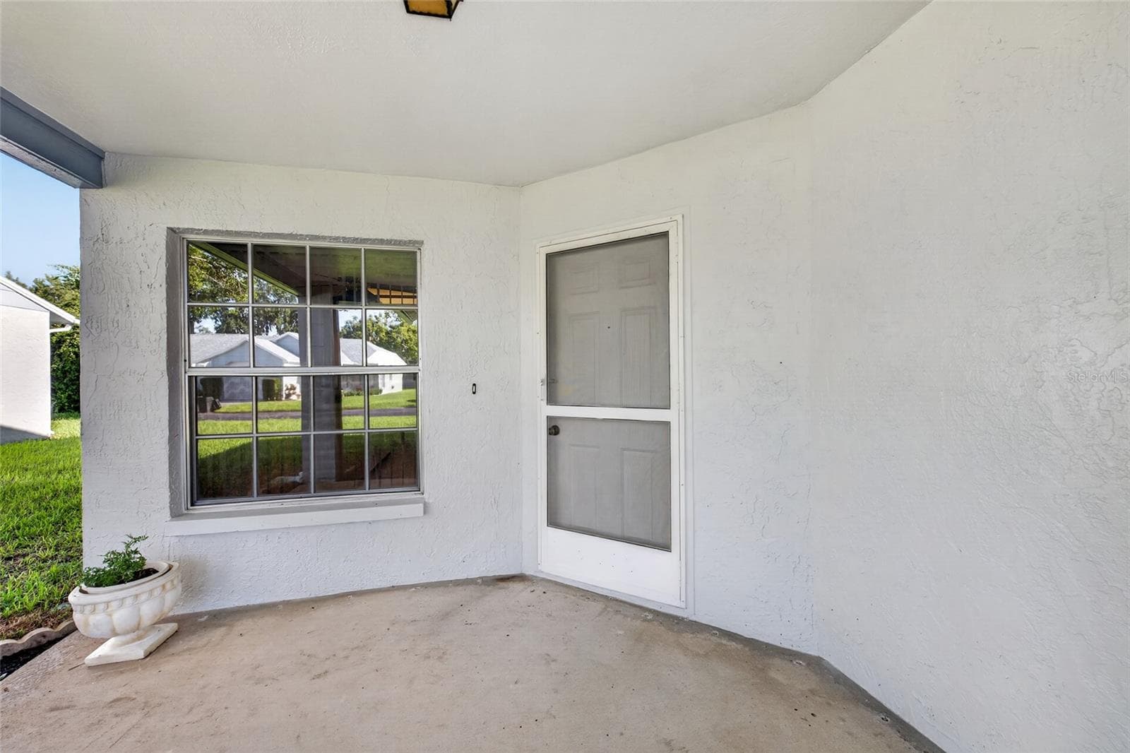 Entrance/Covered Porch- 9545 Danville Court, #42, New Port Richey, FL 34655Wedgewood Village Condos in Heritage Lake - 9545 DANVILLE CT #42, NEW PORT RICHEY