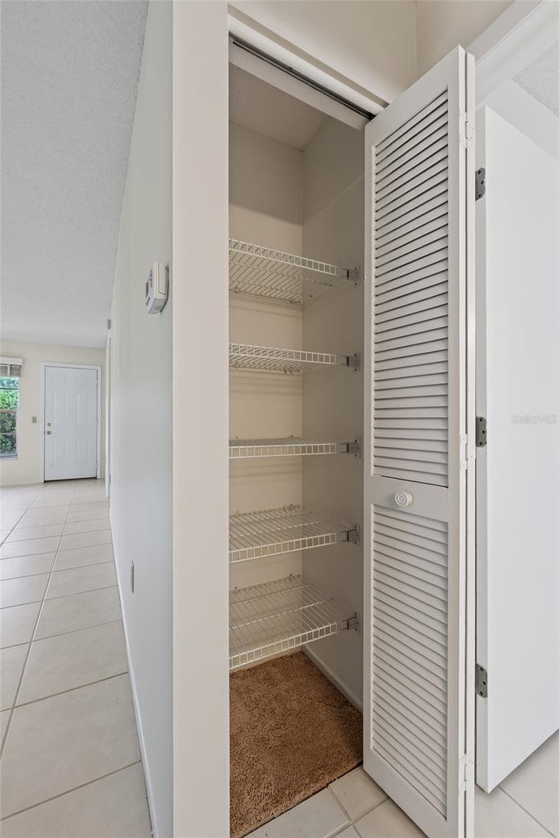 Linen Closet by Front Bedroom- 9545 Danville Court, #42, New Port Richey, FL 34655Wedgewood Village Condos in Heritage Lake - 9545 DANVILLE CT #42, NEW PORT RICHEY