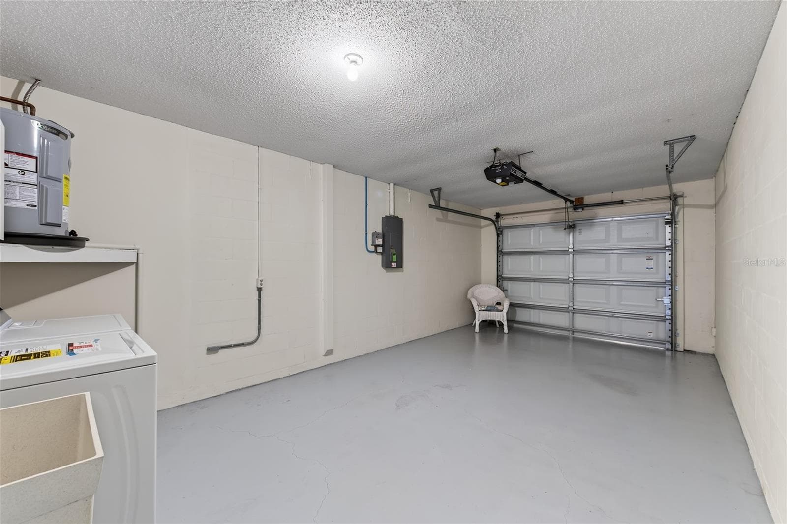 Oversized Garage & Laundry Area- 9545 Danville Court, #42, New Port Richey, FL 34655Wedgewood Village Condos in Heritage Lake - 9545 DANVILLE CT #42, NEW PORT RICHEY