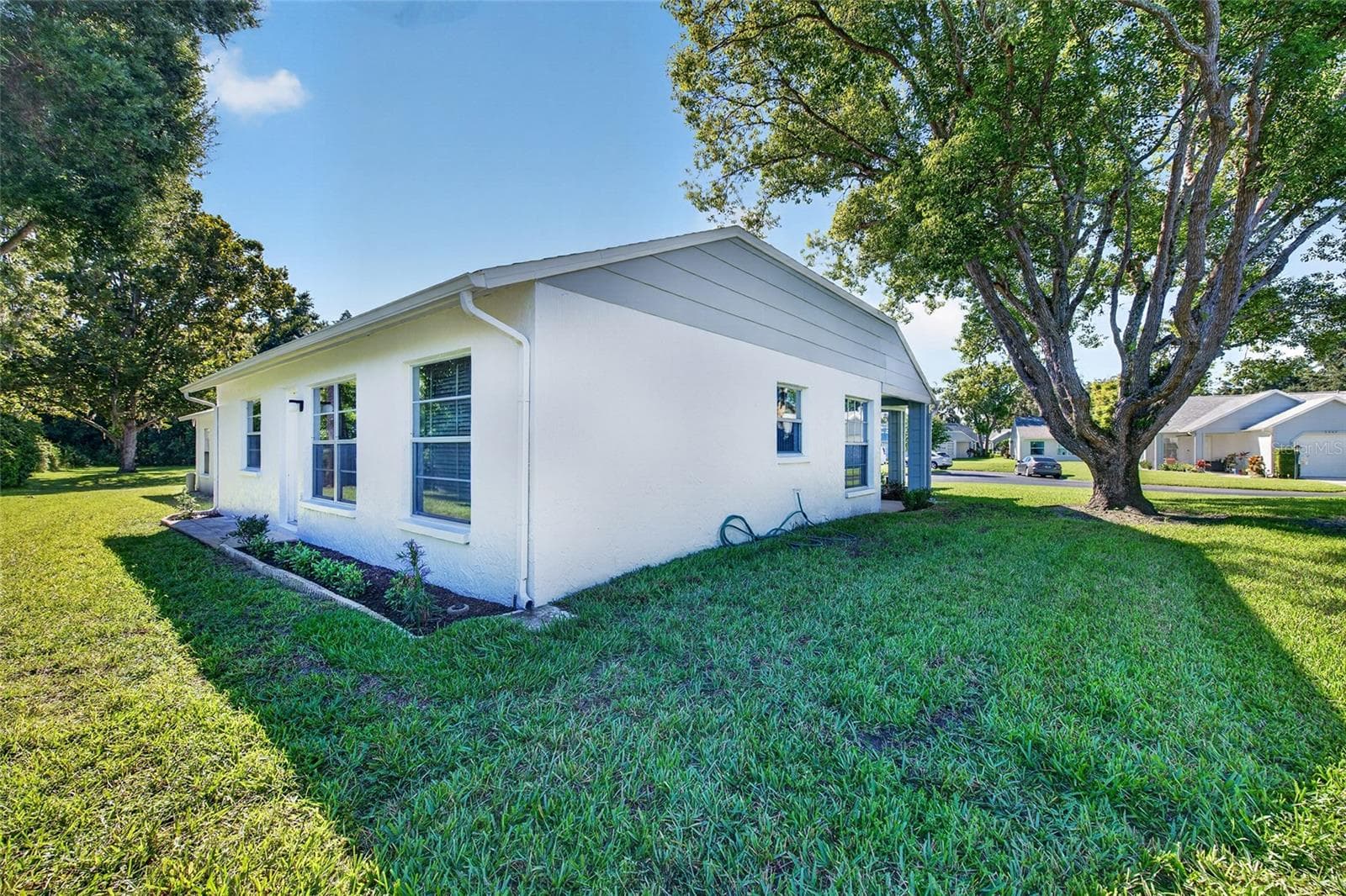 Rear Side View- 9545 Danville Court, #42, New Port Richey, FL 34655Wedgewood Village Condos in Heritage Lake - 9545 DANVILLE CT #42, NEW PORT RICHEY