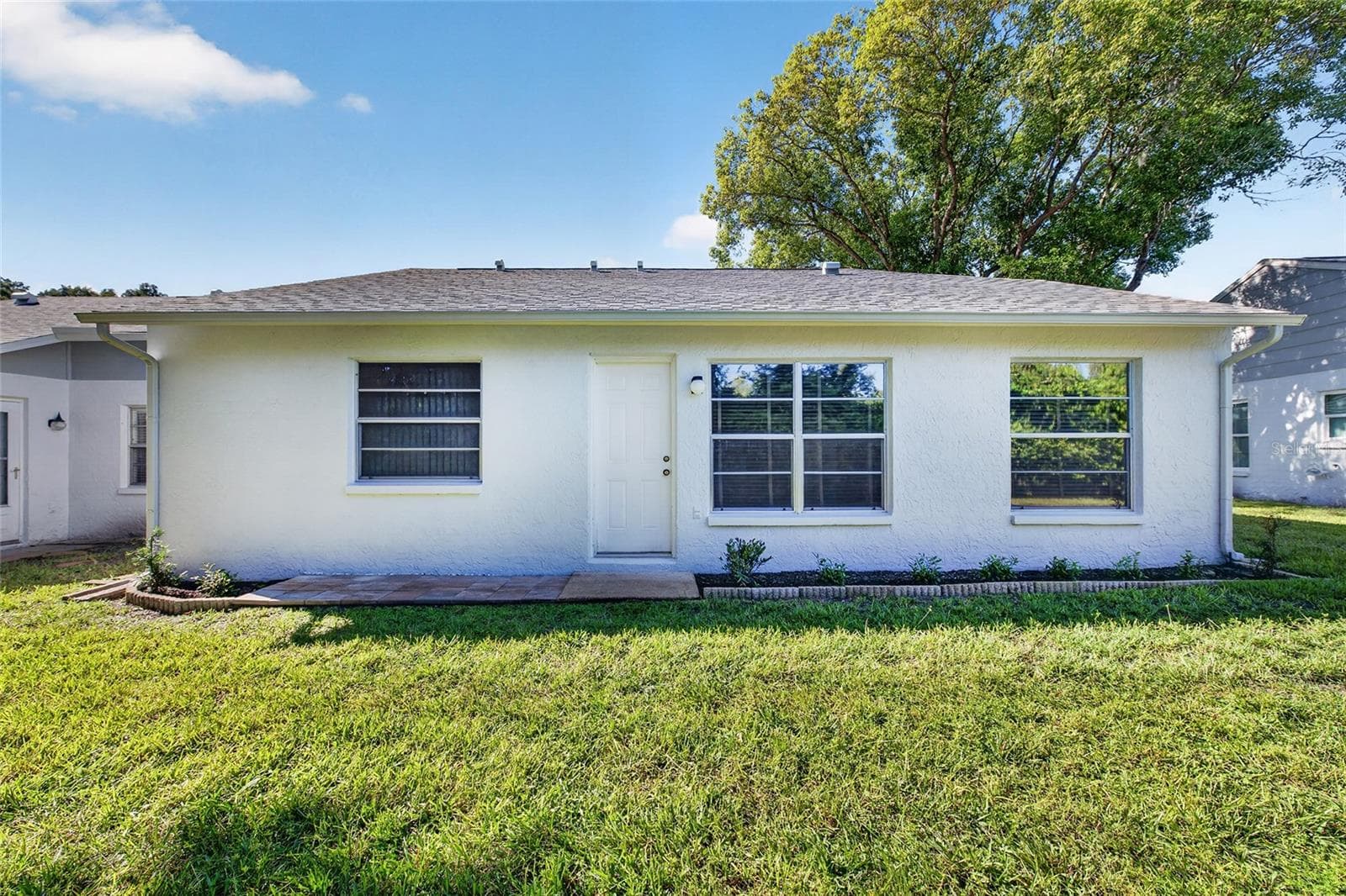 Rear View- 9545 Danville Court, #42, New Port Richey, FL 34655Wedgewood Village Condos in Heritage Lake - 9545 DANVILLE CT #42, NEW PORT RICHEY