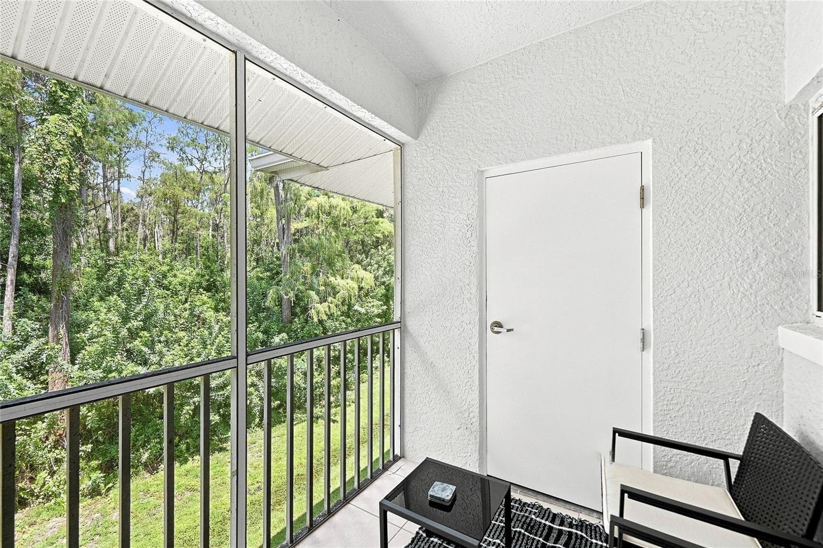 Screened lanai with storage room - 8423 BERNWOOD COVE LOOP #410, FORT MYERS