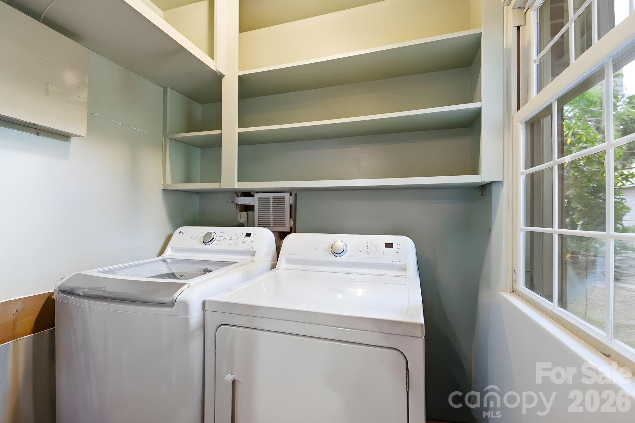 Laundry off dining area - 10687 Cruso Road, Canton