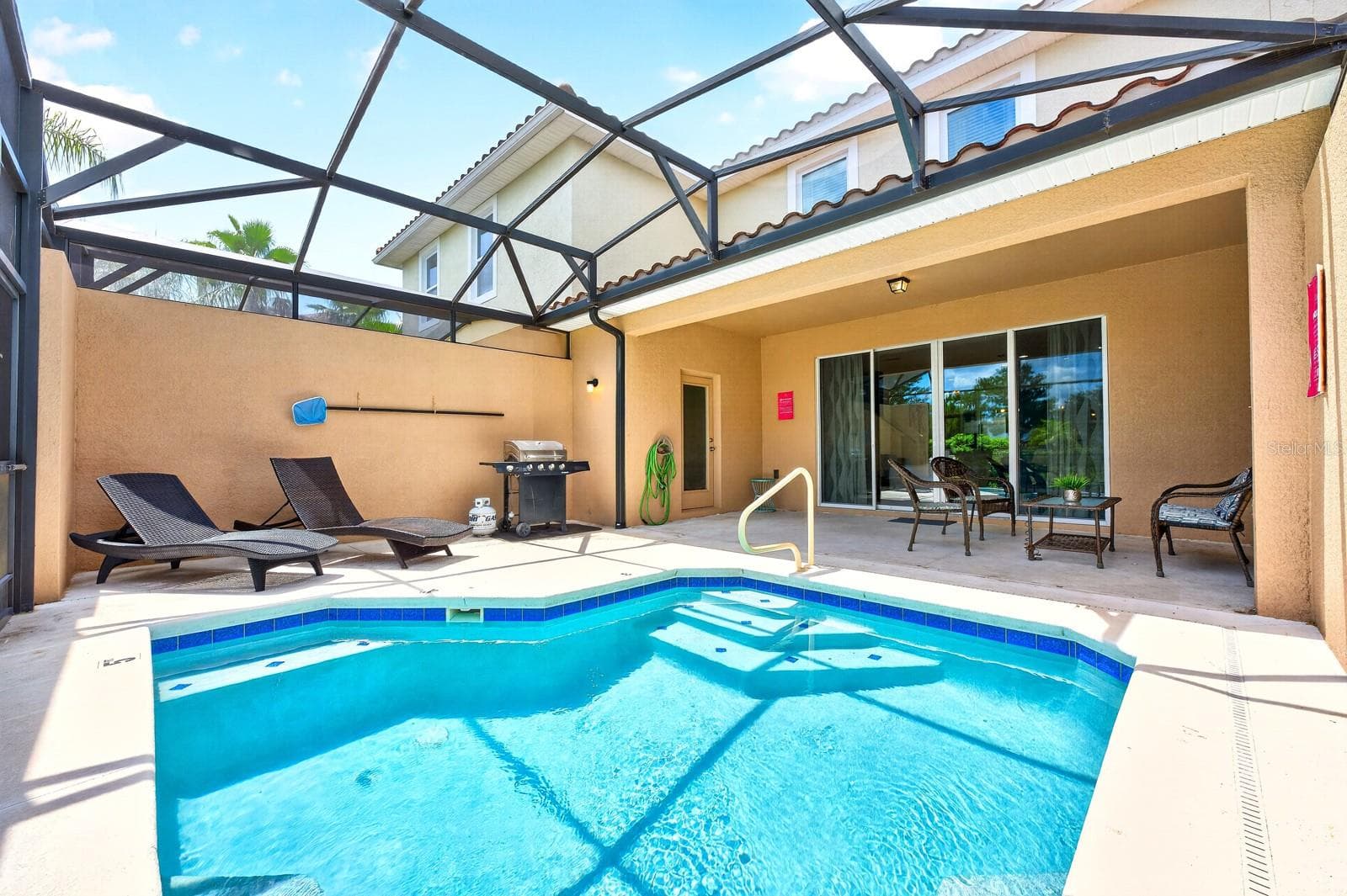 The PRIVATE HEATED POOL, NO REAR NEIGHBORS and 24-HOUR GUARD-GATED setting make it an especially appealing choice as a vacation home, investment property or full-time residence. - 4722 TERRASONESTA DR, DAVENPORT