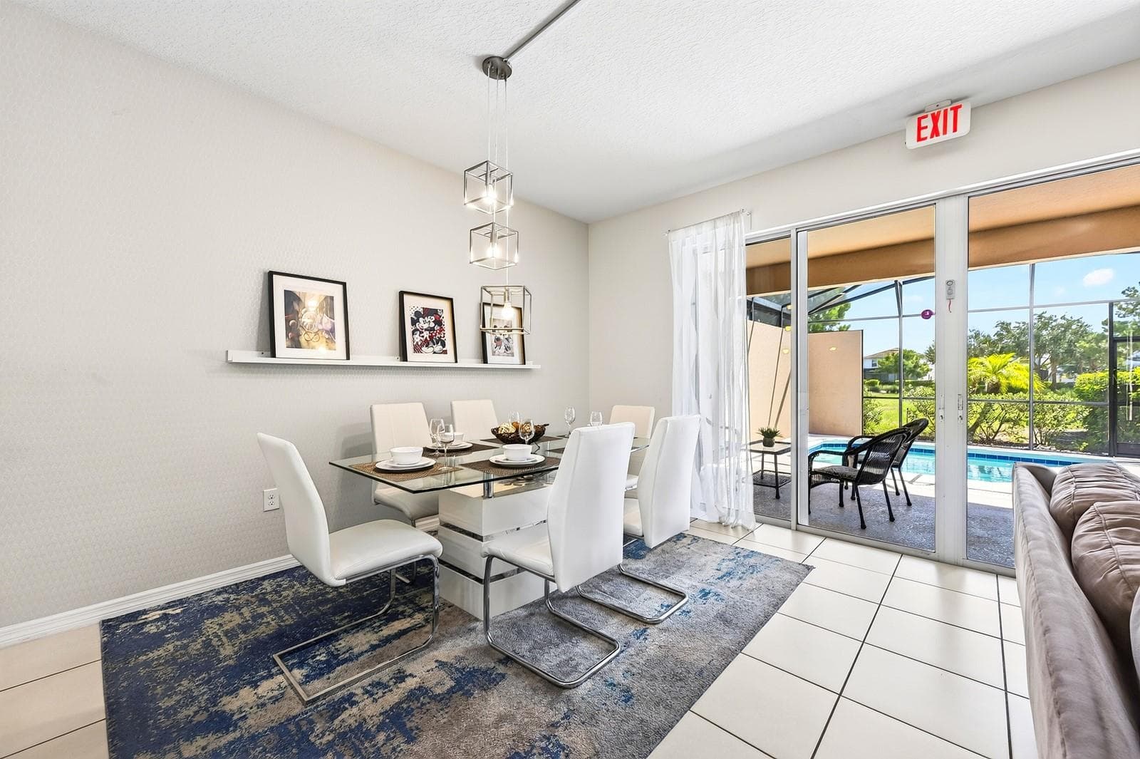 The Dining Area sits just off the Kitchen and offers direct access through sliding glass doors to the outdoor living space. - 4722 TERRASONESTA DR, DAVENPORT