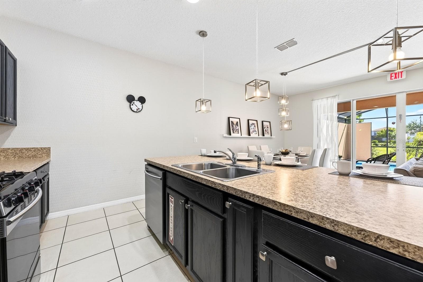 A generous center island offers extra prep space and room for counter-height seating. - 4722 TERRASONESTA DR, DAVENPORT