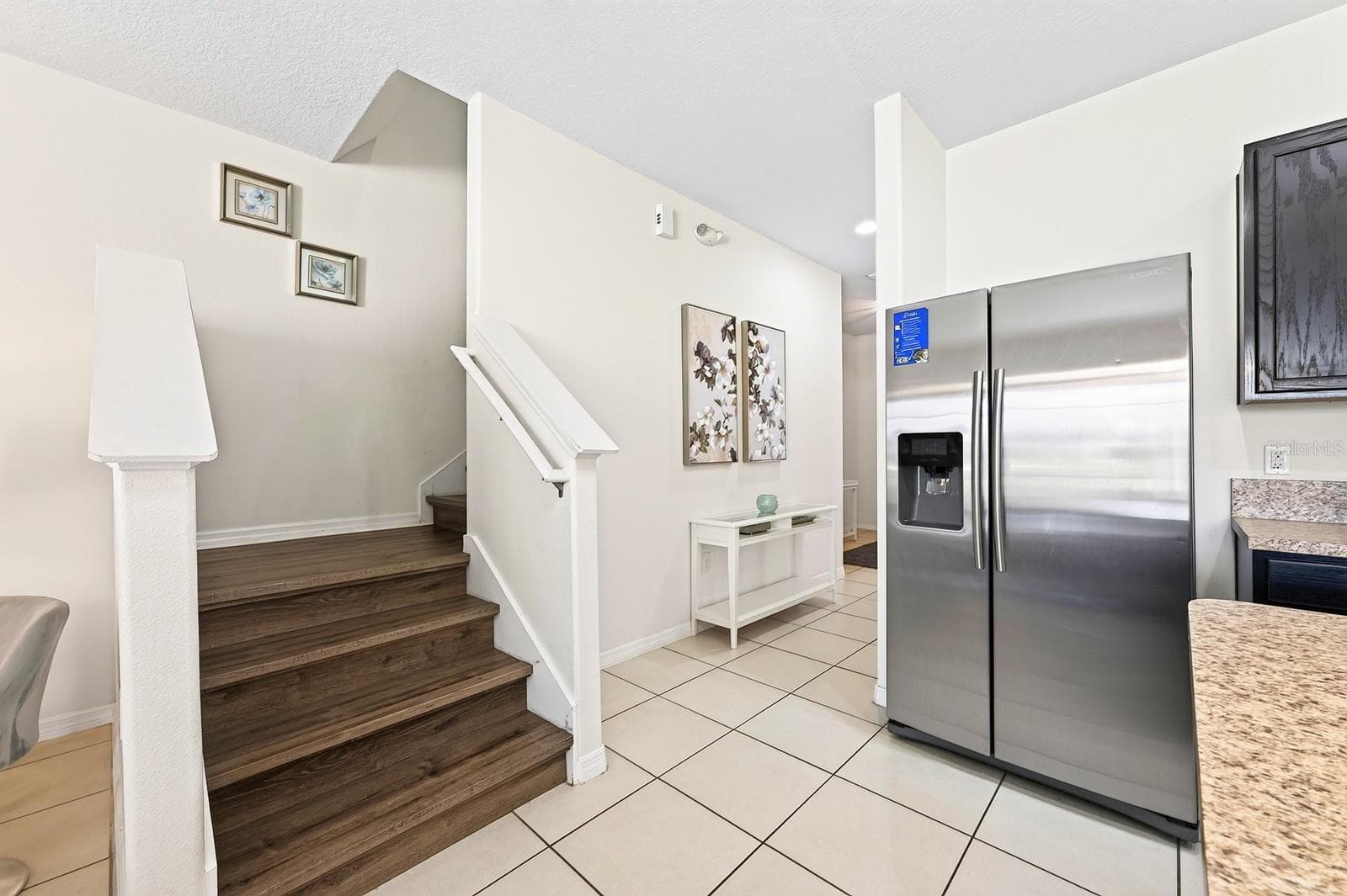 Upstairs, NEW LAMINATE FLOORING installed in 2023, runs throughout the second floor. - 4722 TERRASONESTA DR, DAVENPORT