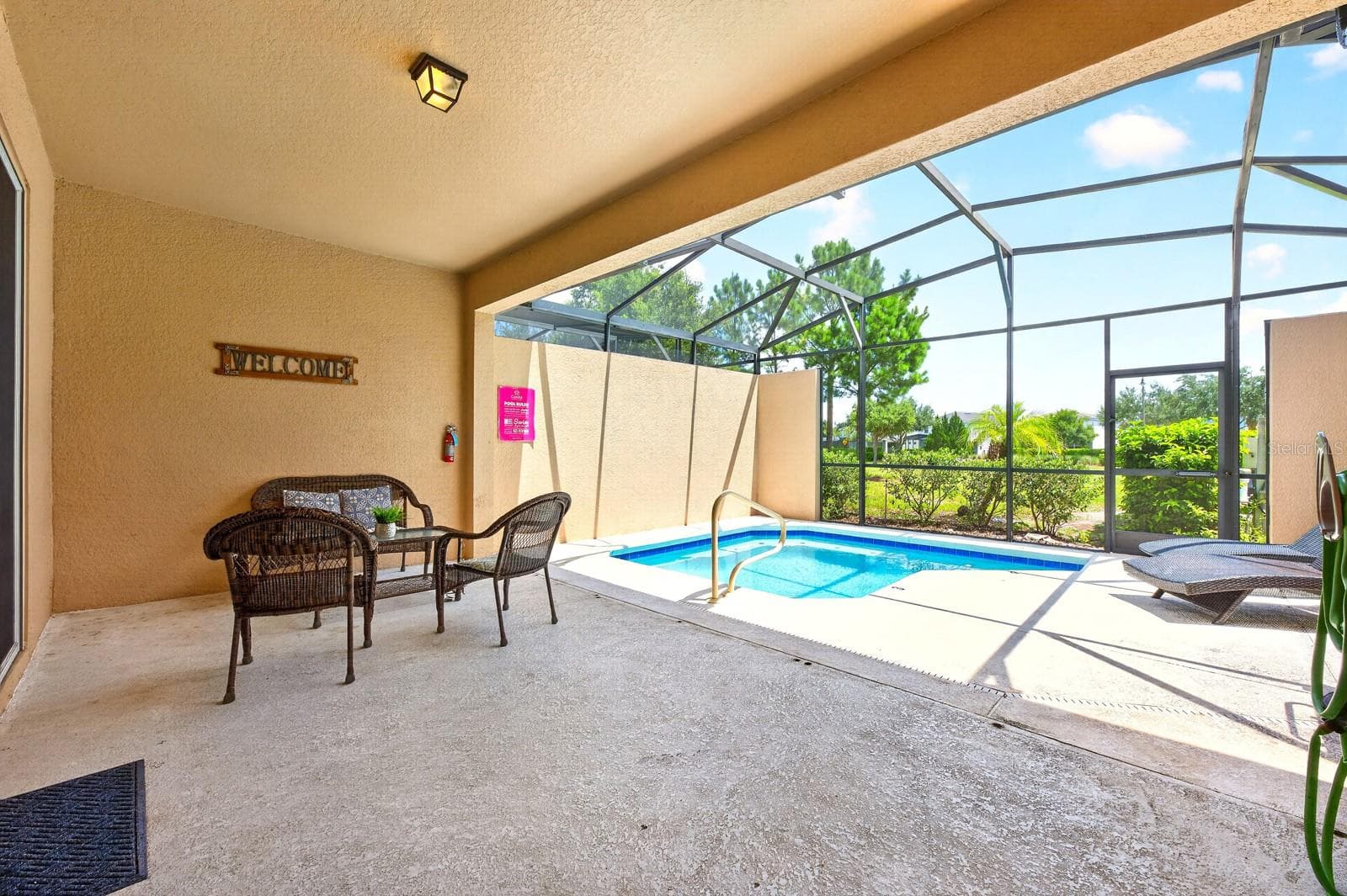 The covered and screened lanai provides a comfortable setting for relaxing, dining and entertaining. - 4722 TERRASONESTA DR, DAVENPORT