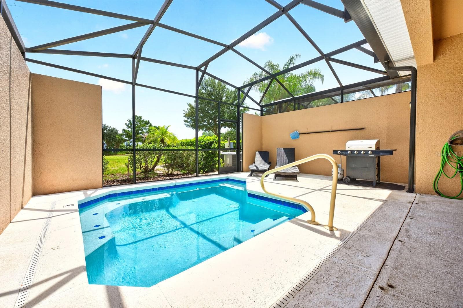 The PRIVATE IN-GROUND HEATED POOL makes it easy to enjoy the Florida sunshine year-round. - 4722 TERRASONESTA DR, DAVENPORT