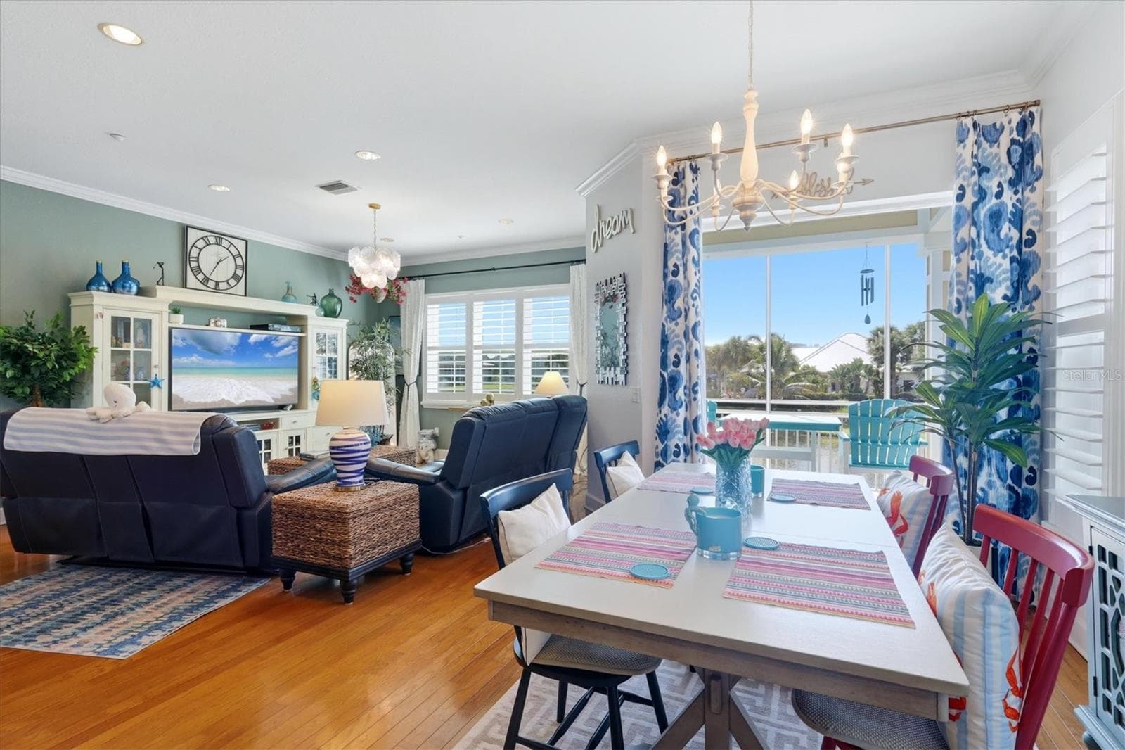 French doors flow onto the balcony overlooking lake & pool - 10301 CORAL LANDINGS LN #5, PLACIDA