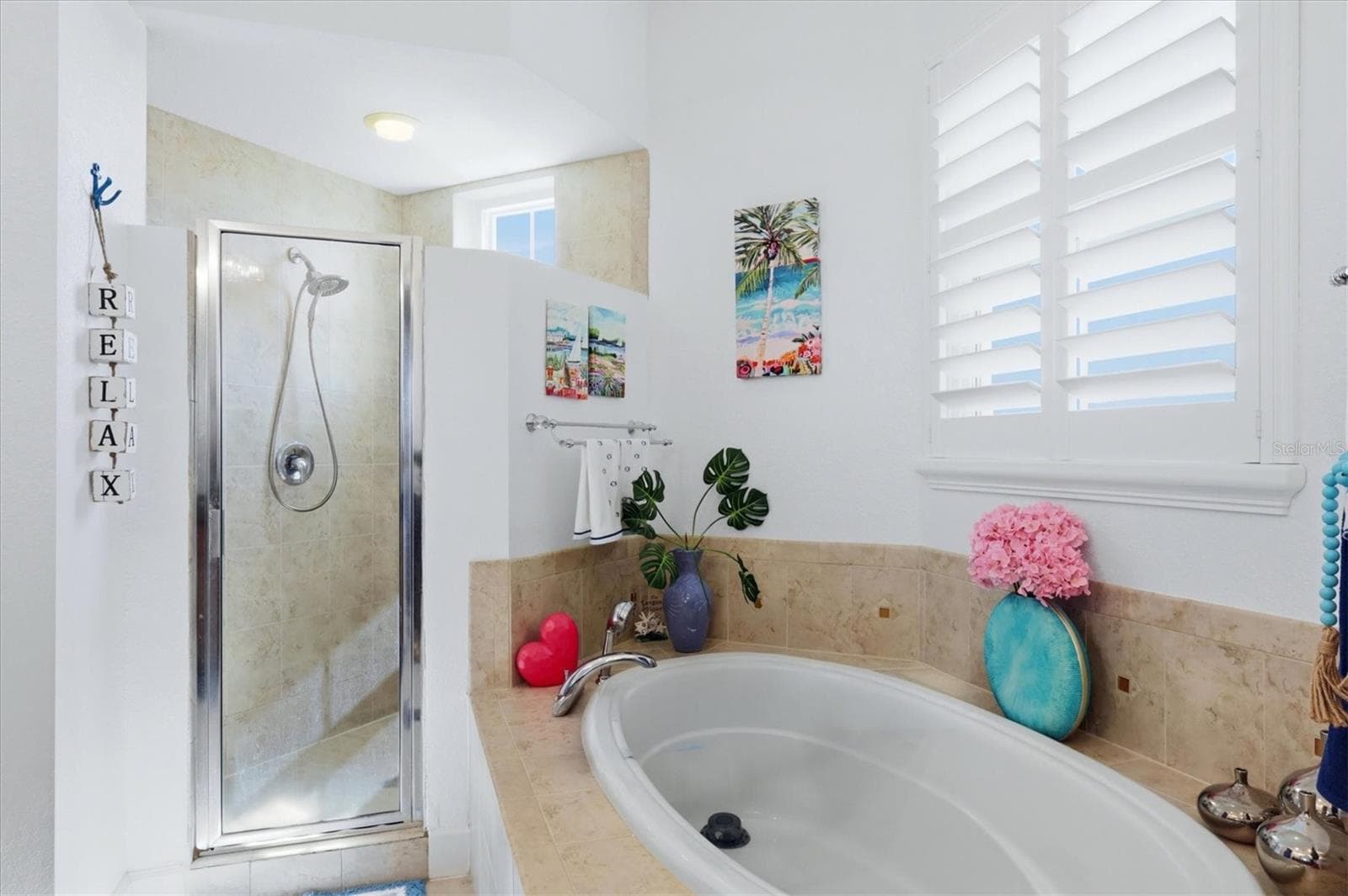 Primary Bath has a large soaking tub and separate shower - 10301 CORAL LANDINGS LN #5, PLACIDA