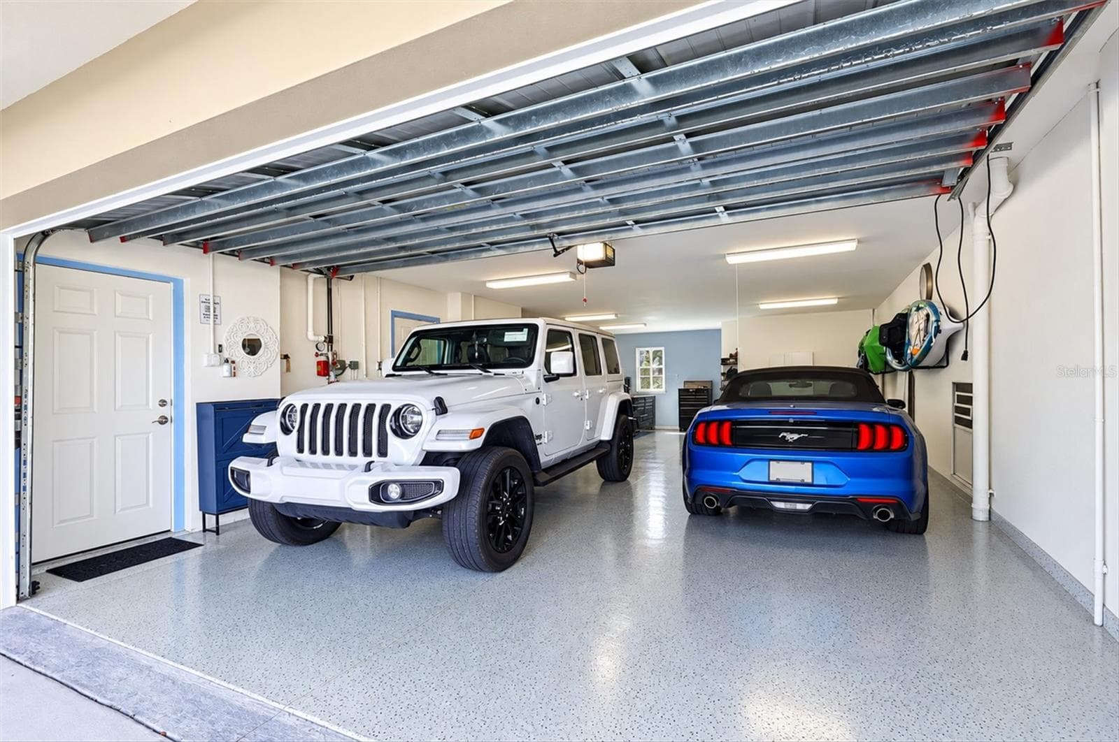 Oversized 4 car garage will accomodate boats, vehicles & all your toys - 10301 CORAL LANDINGS LN #5, PLACIDA