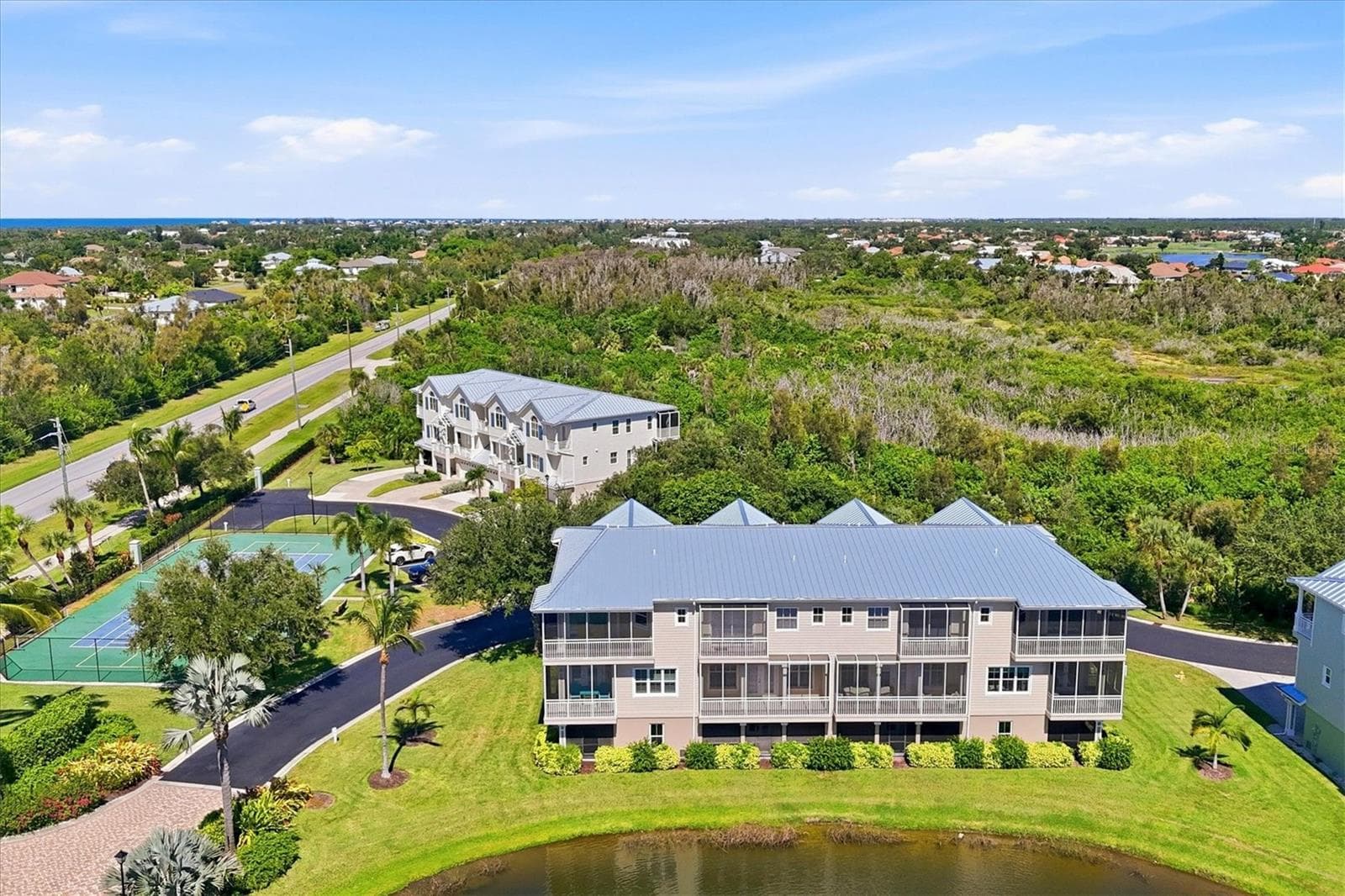 Aerial views of rear of townhome - 10301 CORAL LANDINGS LN #5, PLACIDA