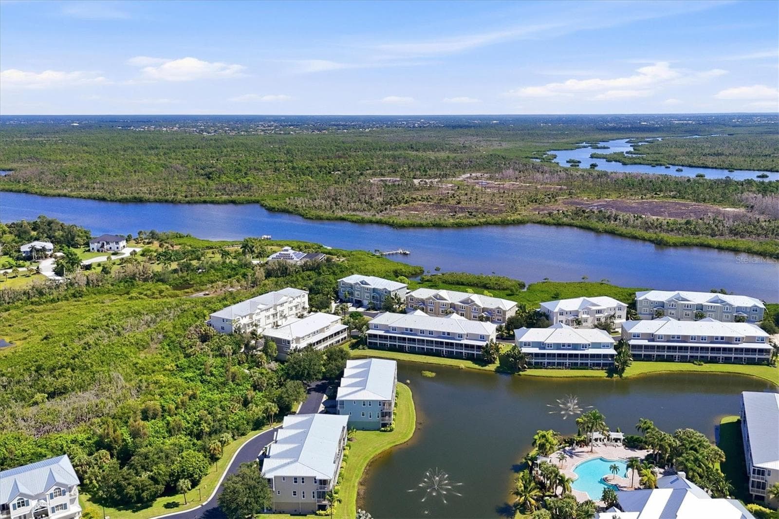 The Landings at Coral Creek is positioned overlooking Coral Creek to the East - 10301 CORAL LANDINGS LN #5, PLACIDA