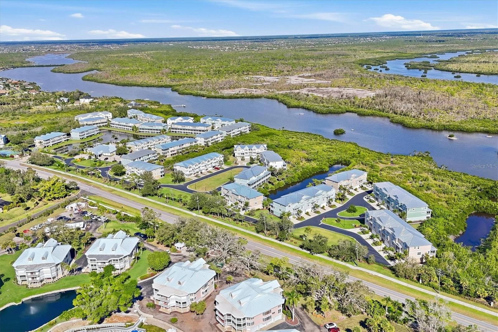 Aerial views overlooking Coral Creek - 10301 CORAL LANDINGS LN #5, PLACIDA