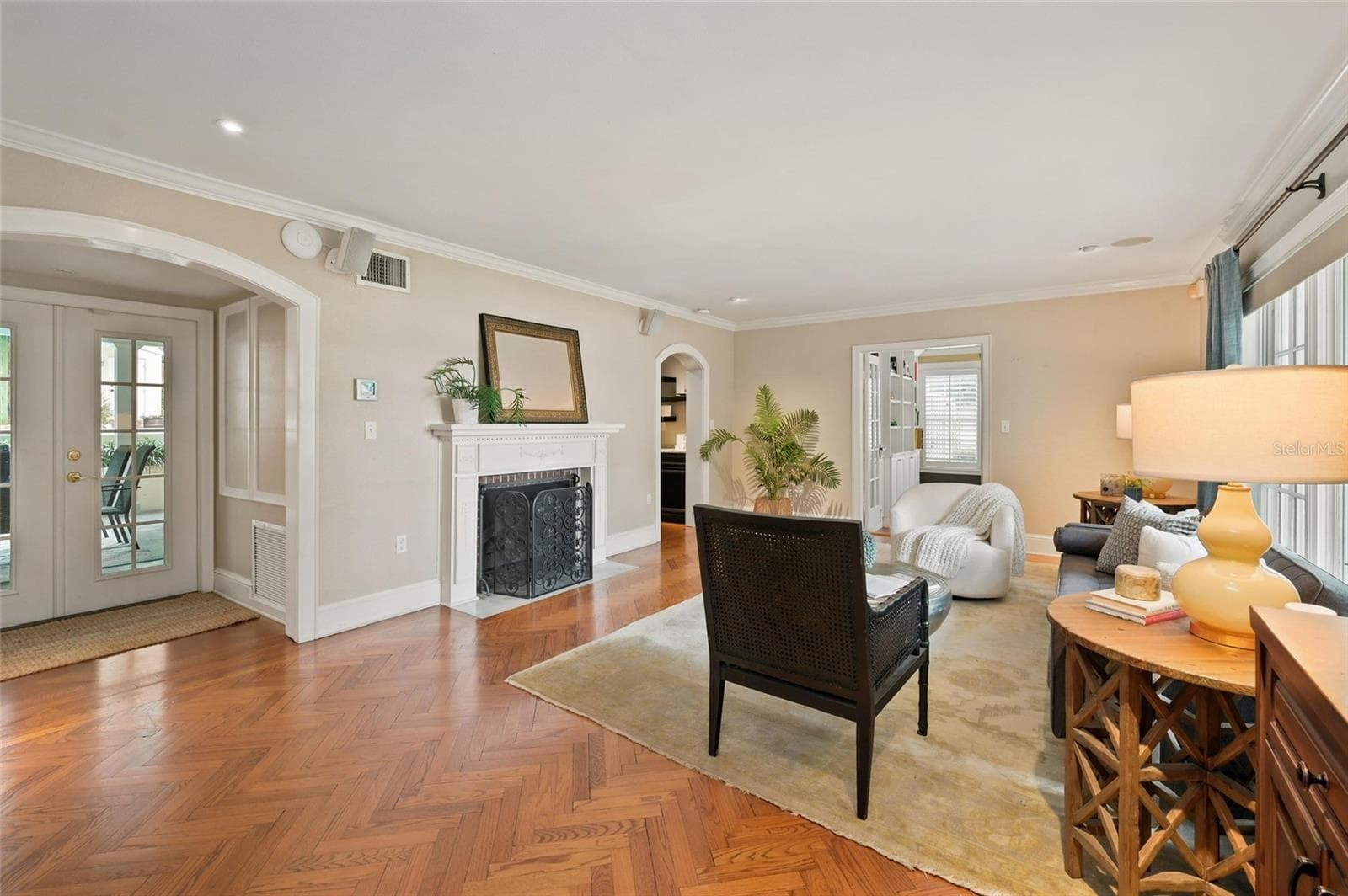 Formal Living Room with Wood Burning Fireplace, Privately Located Bathroom and French Doors to Covered Lanai. - 1221 DORCHESTER ST, ORLANDO