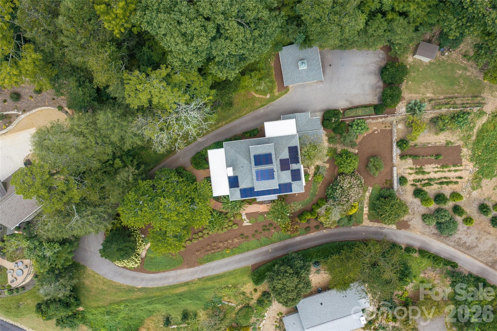 The home features a usable flat yard, stone wall gardens and stunning landscape. - 35 Elias Place, Asheville