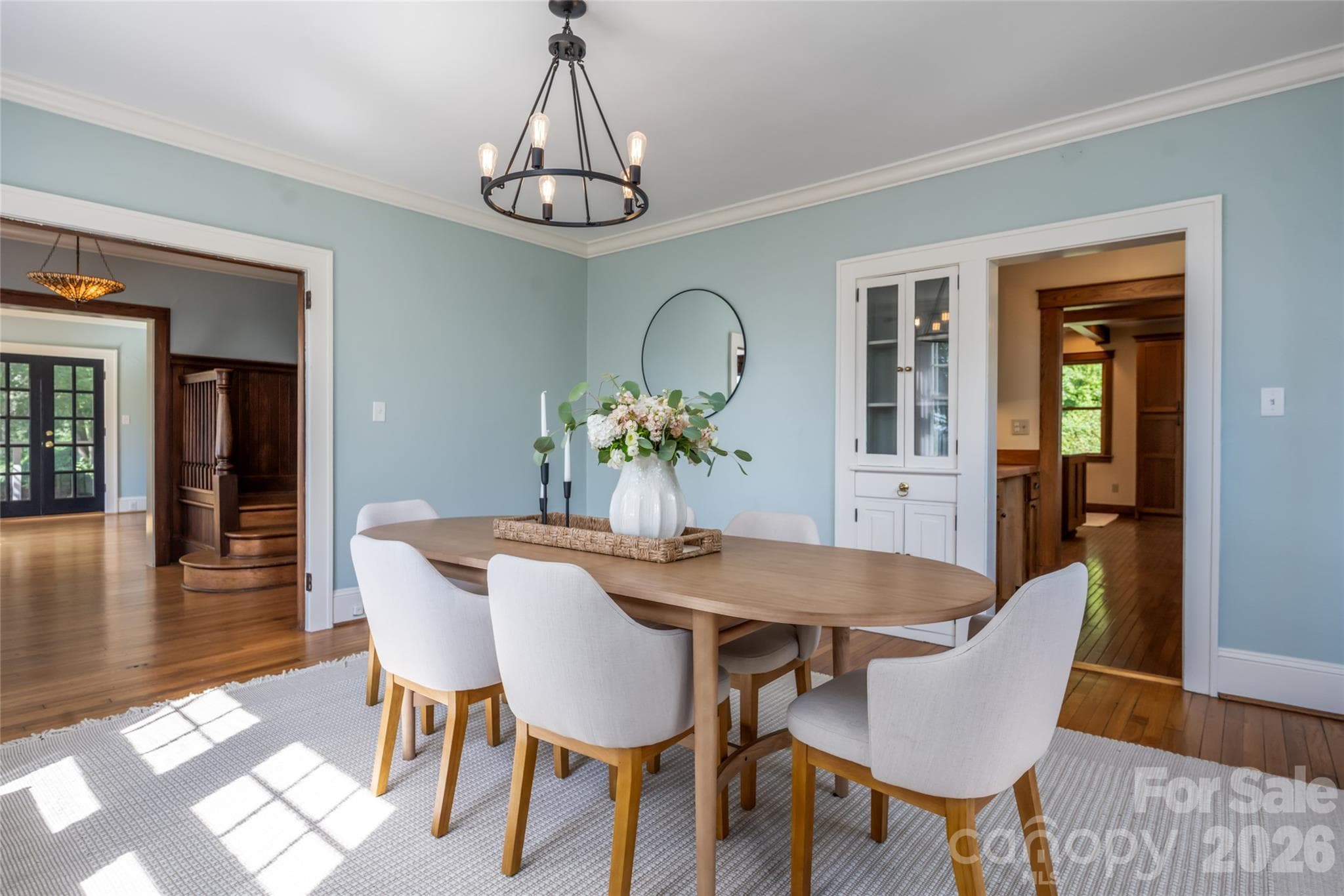 The dining room boast charming built ins and access to the butlers pantry and kitchen. - 35 Elias Place, Asheville