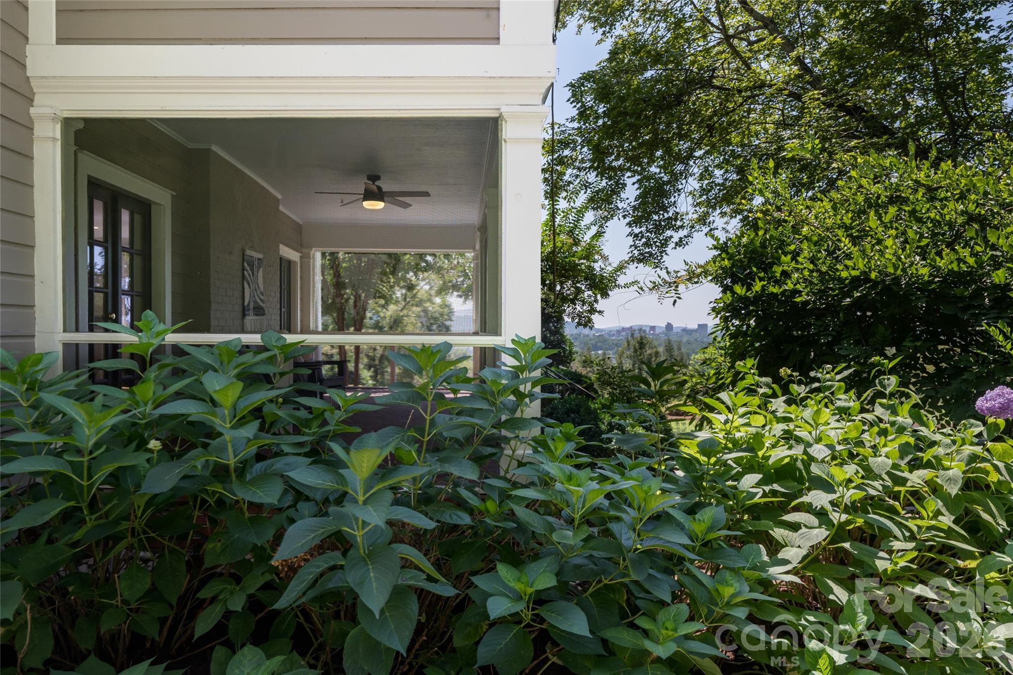 The stunning landscaping is visible from all over the property - 35 Elias Place, Asheville