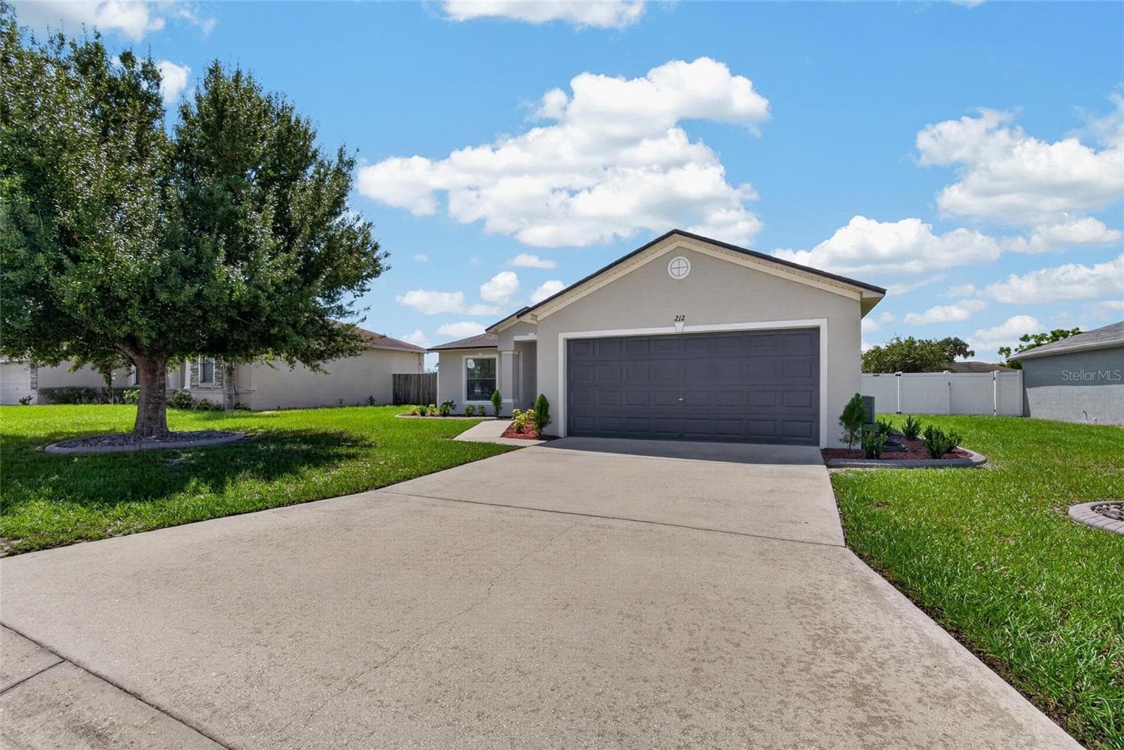 Single Family Residence at 212 MAJESTIC GARDENS LN, WINTER HAVEN, photo 2 of 48