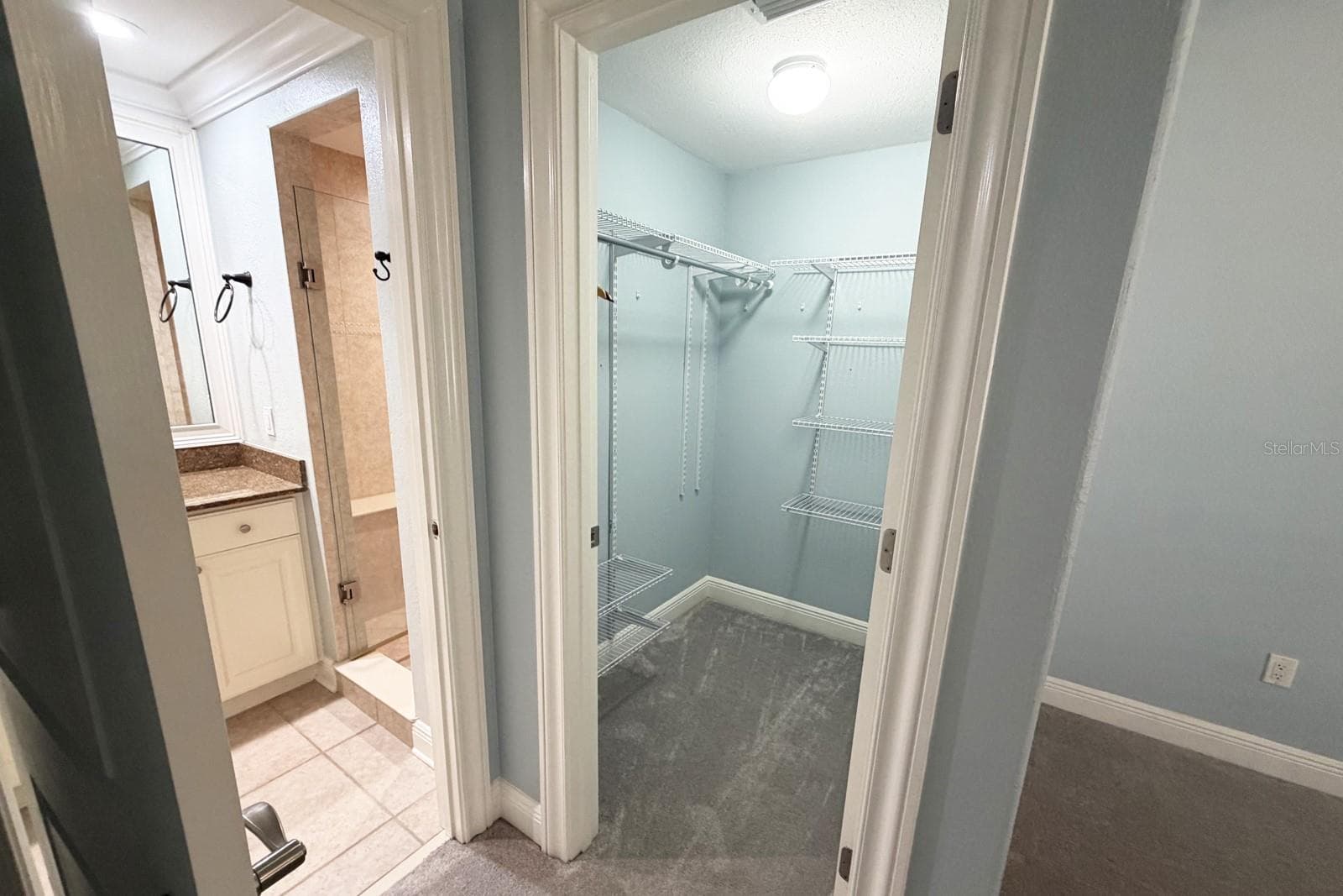 2nd Bedroom Walkin Closet with access to Bathroom - 112 CLUB HOUSE DR #102, PALM COAST