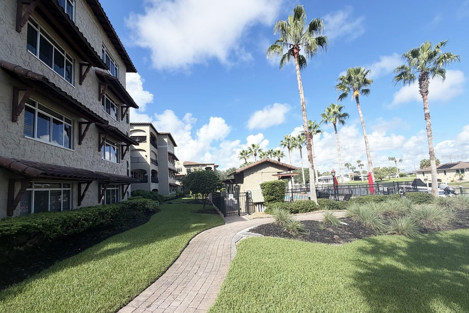 Outside walkway to Pool - 112 CLUB HOUSE DR #102, PALM COAST