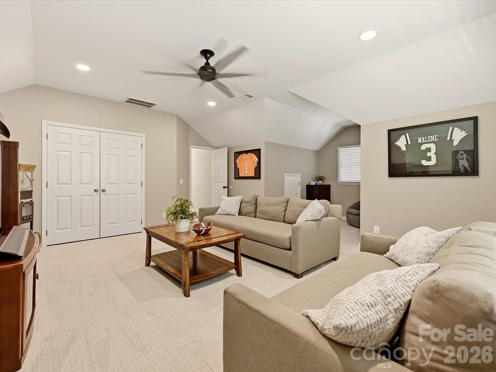 Spacious bonus room provides flexible additional living space with a vaulted ceiling and abundant room for entertaining or relaxing. - 19706 Valiant Way, Cornelius