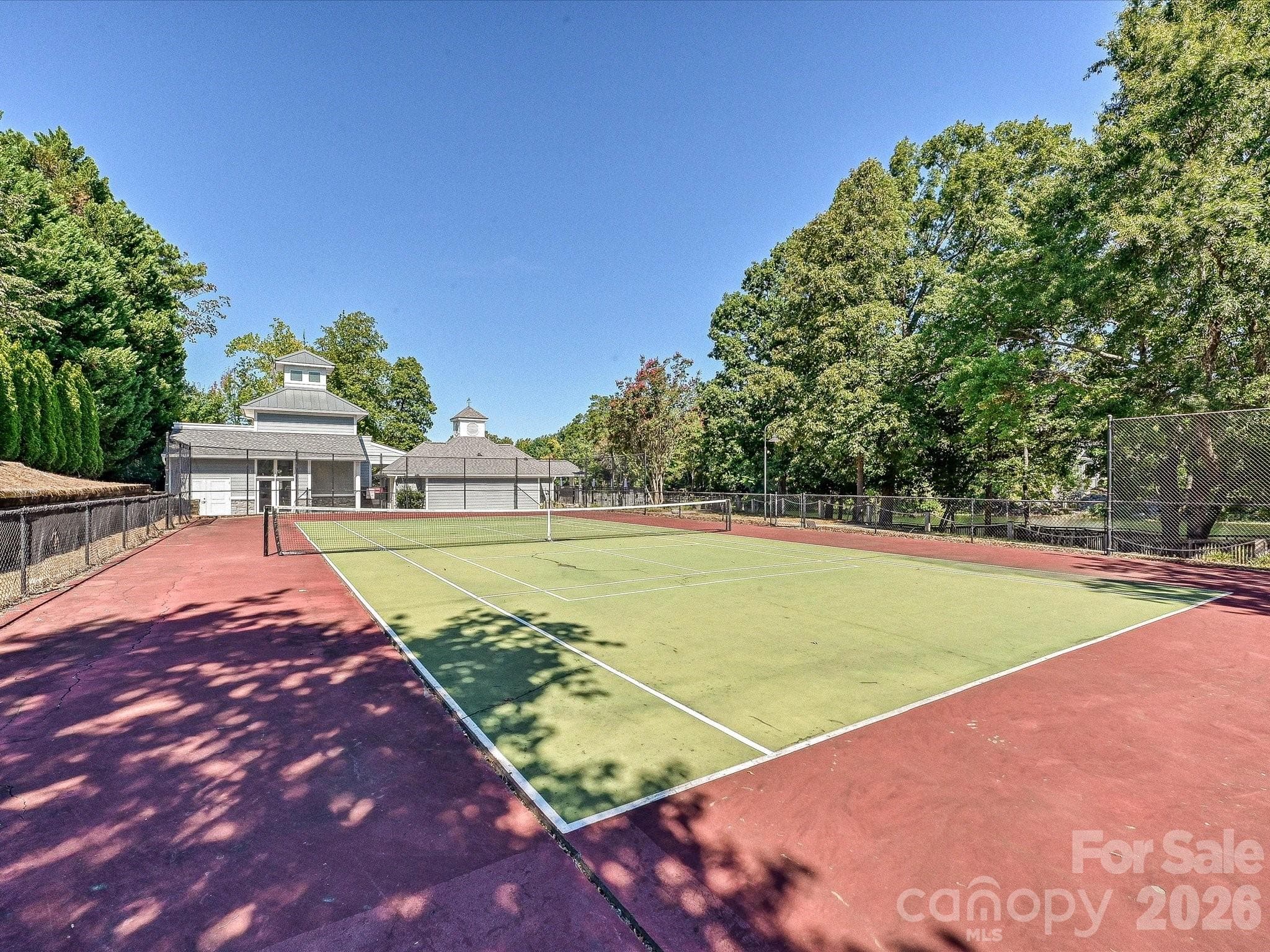 Community tennis courts provide additional recreation within the amenity-rich Blue Stone Harbor neighborhood. - 19706 Valiant Way, Cornelius