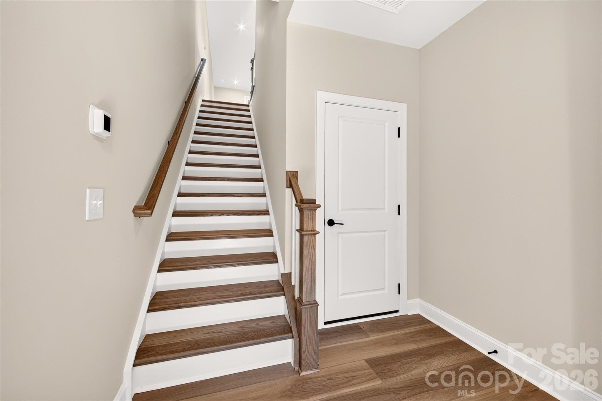 Oak box stairs with open rails - 411 Old Town Village Road, Waxhaw
