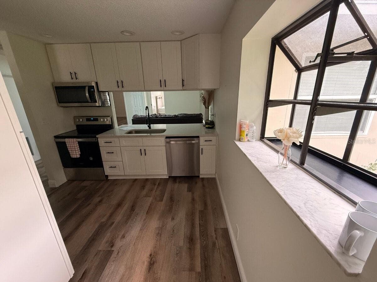 Single Family Residence at 13034 CLAY AVE, LARGO, photo 14 of 26